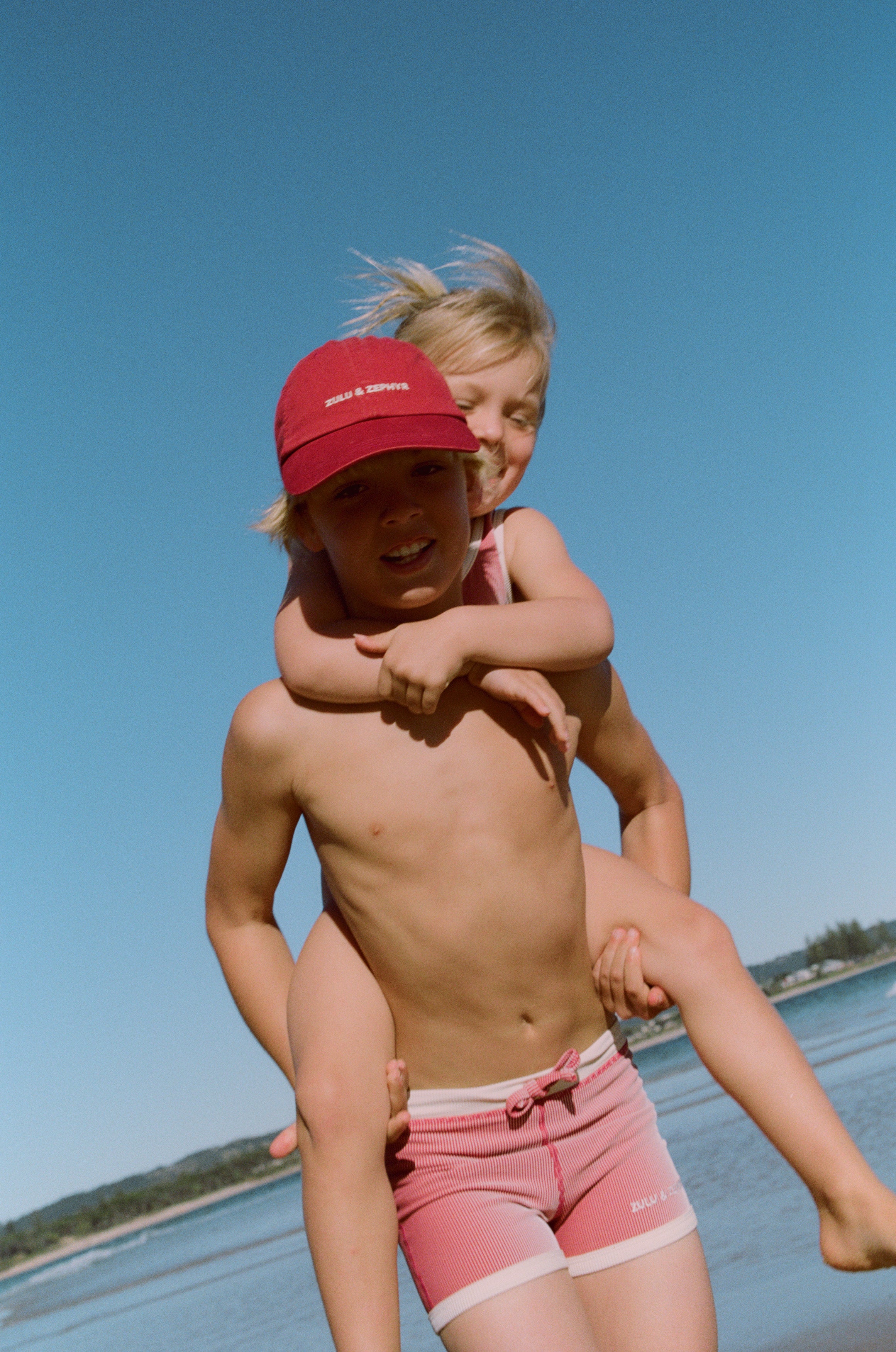 Zulu & Zephyr - Mini Stripe Surf Short Clay Red