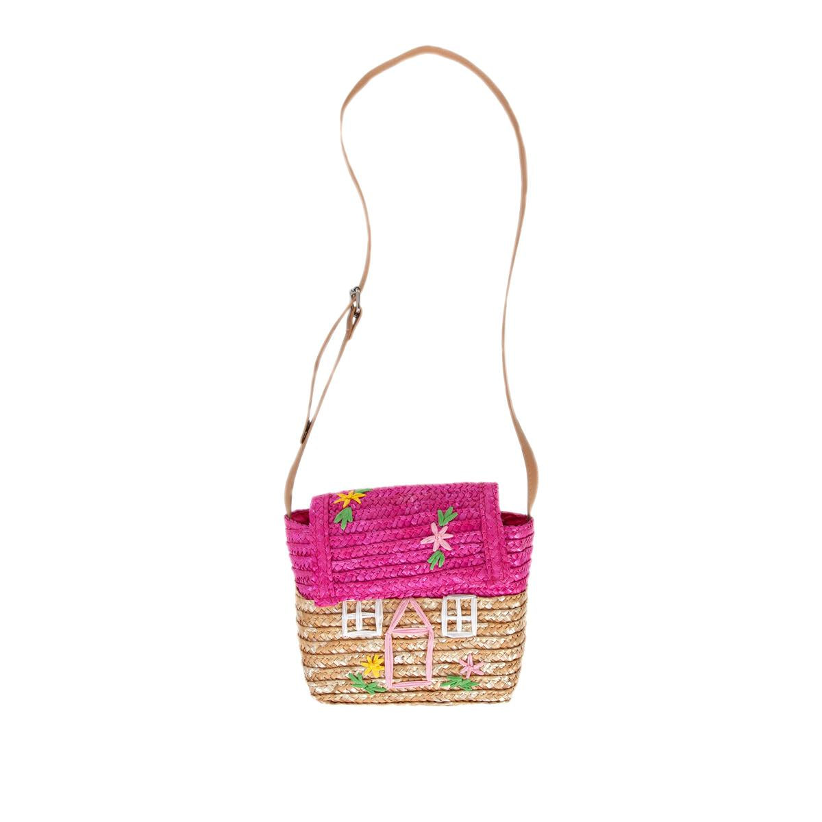 The Acorn Kids - La Maison Straw Bag Pink by ACORN KIDS is a whimsical kids' crossbody bag shaped like a house, with a pink roof flap, tan body, door, windows, embroidered flowers, and a long strap—perfect for playful adventures.
