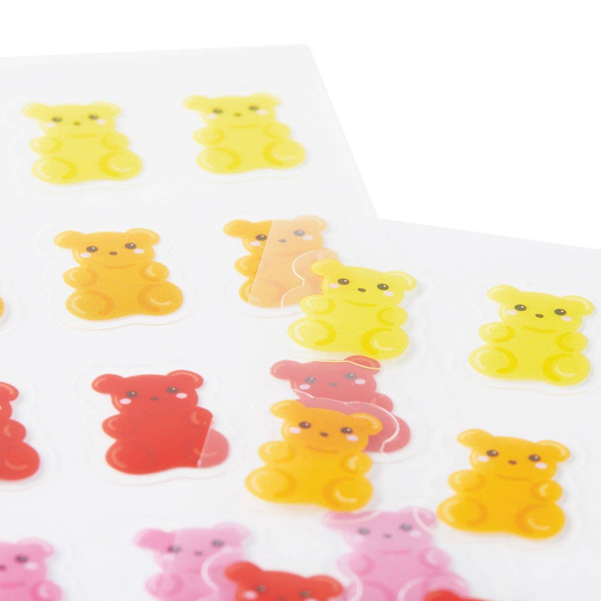 Add fun to your day with OOLY's Stickiville Skinny Gummy Bears stickers—colorful sheets of yellow, orange, red, and pink bears by OOLY, each with a cute smile! Ideal for decorating school supplies and more.