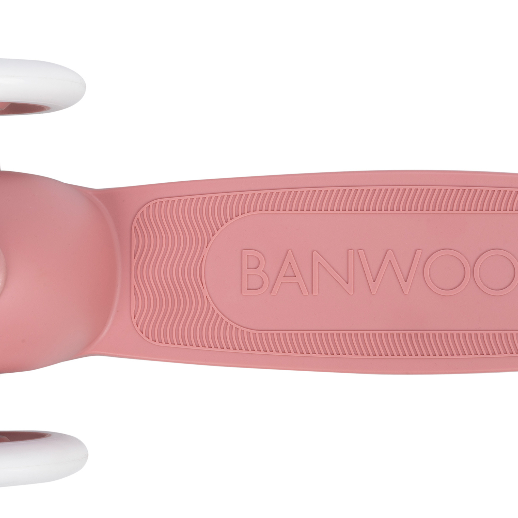Close-up of a Banwood - Eco Scooter Raspberry deck, embossed with "BANWOOD," made from recycled plastic. The deck features textured grip details with parts of white wheels visible on the left, highlighting its sustainable design for young riders.