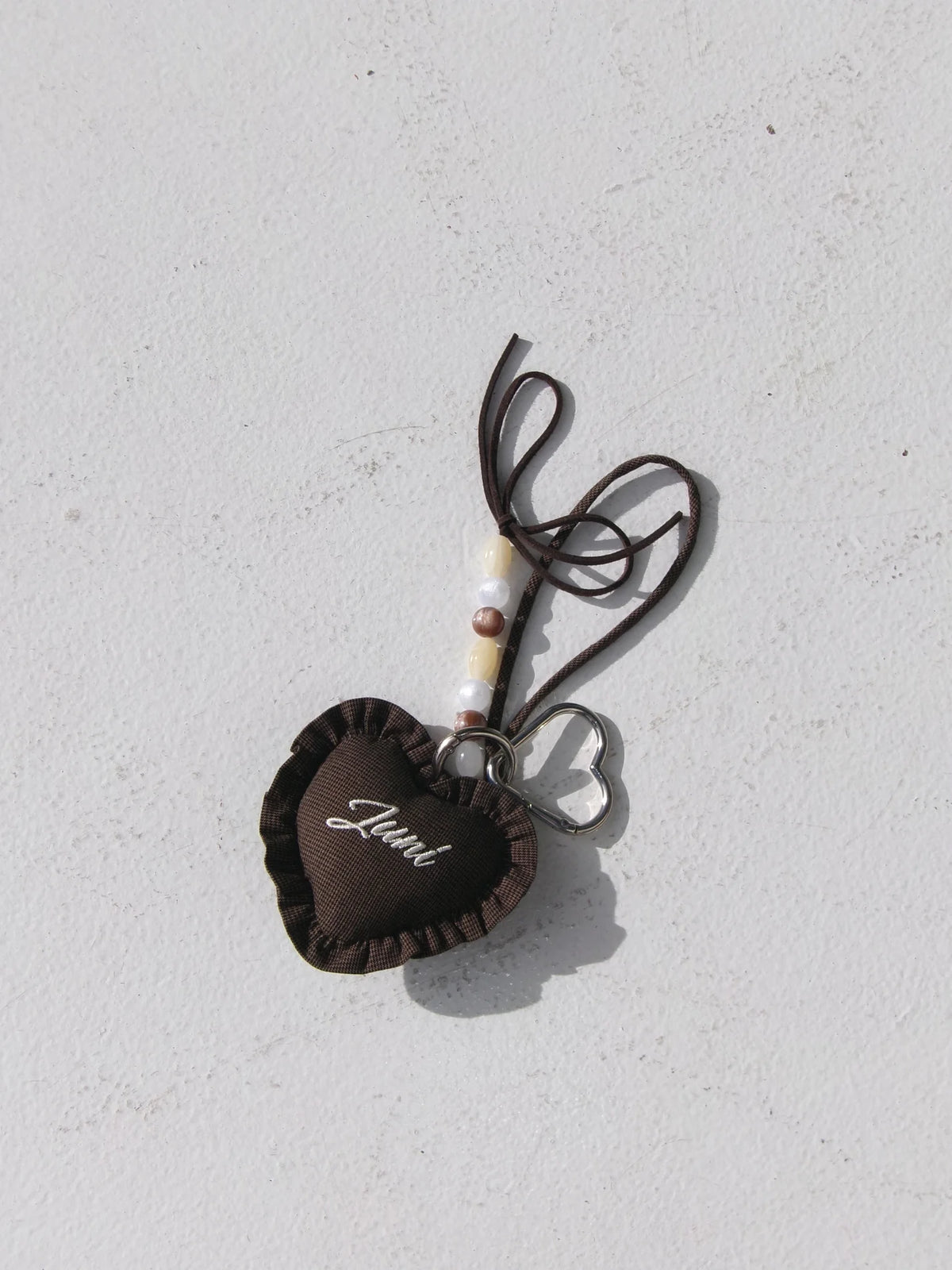 JUNI - Heart Bag Charm Espresso Check
