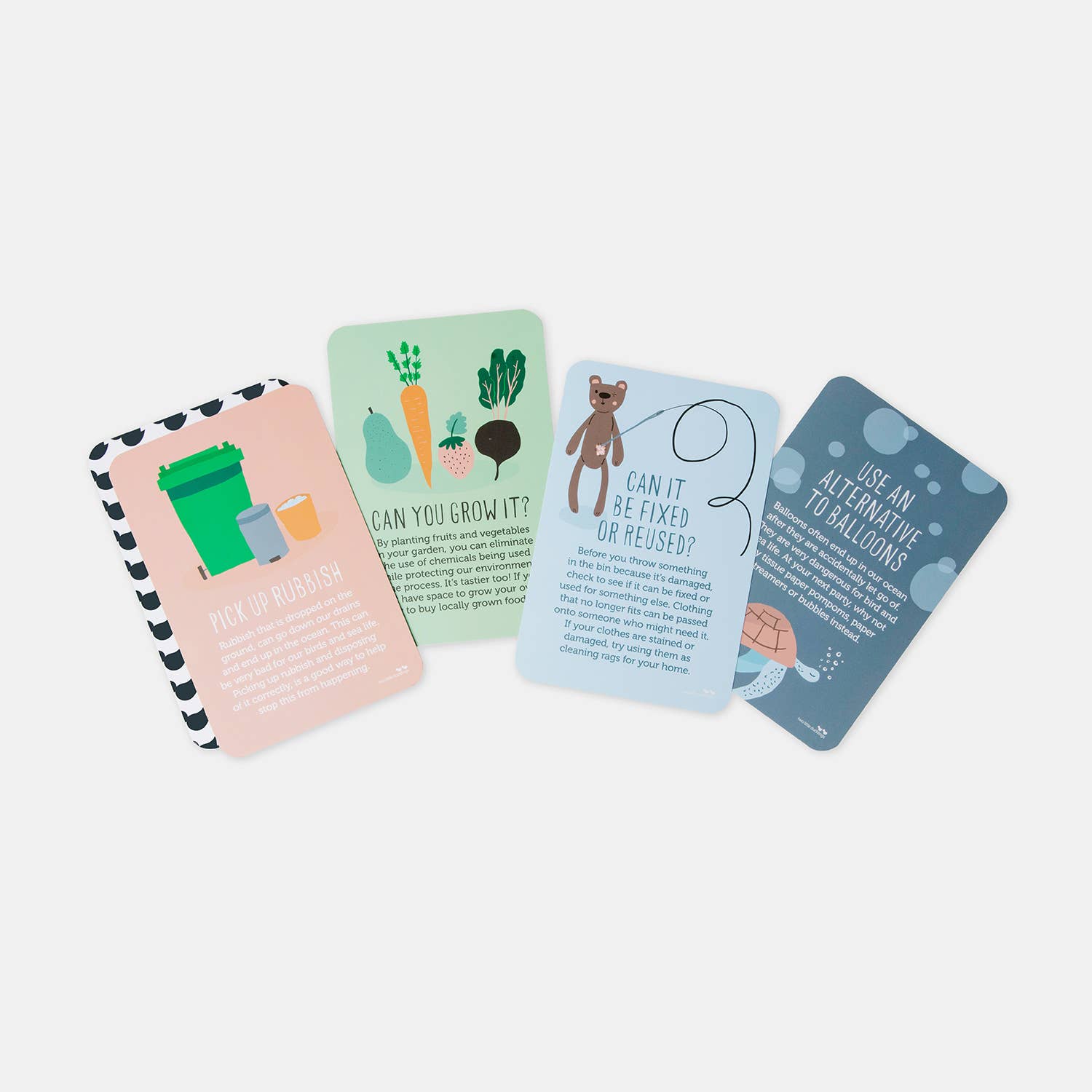 An image of four environmental education cards from TWO LITTLE DUCKLINGS' Planet Love series featuring eco-friendly learning tools. The cards read: "Pick up rubbish," "Can you grow it?" with a picture of vegetables, "Can it be fixed or reused?" showing a teddy bear, and "Use an alternative to balloons" depicting a hand holding a cloth bag.