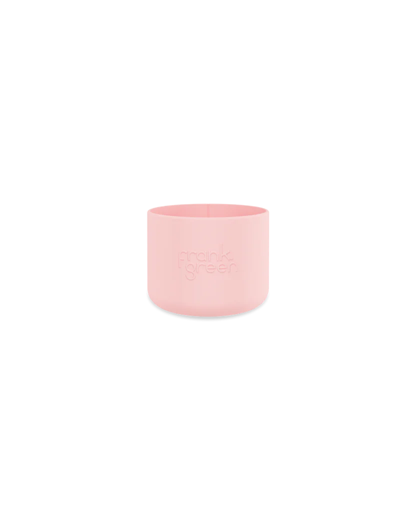 A chic pink bottle bumper guard labeled "FRANK GREEN" sits elegantly against a plain black background, highlighting its eco-friendly charm.