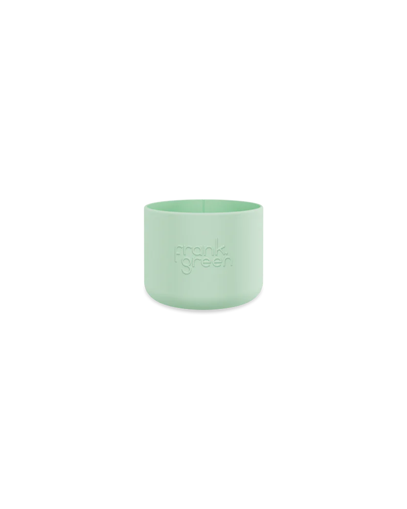 A mint green bottle bumper guard named "Mint Gelato" from FRANK GREEN features a minimal design with embossed branding, resembling a sleek ceramic reusable bottle against a plain black background.