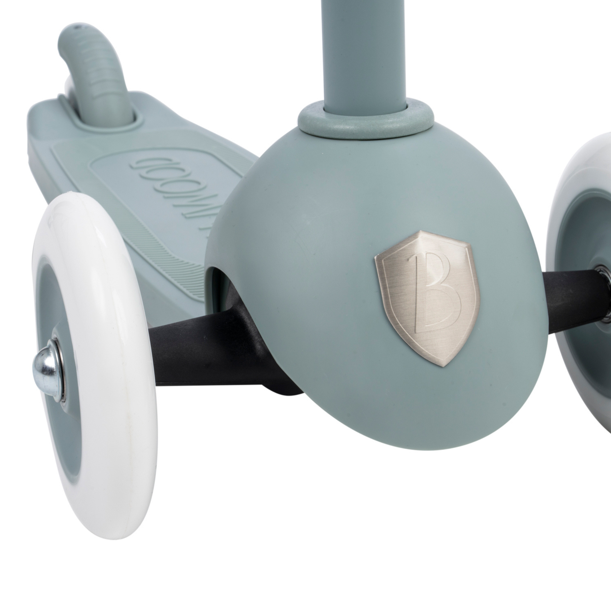 The Banwood Eco Scooter, a children's scooter made from recycled plastic, flaunts a teal body with a silver badge, dual white front wheels, and a textured footboard. Its minimalist and modern design underscores its eco-friendly focus.