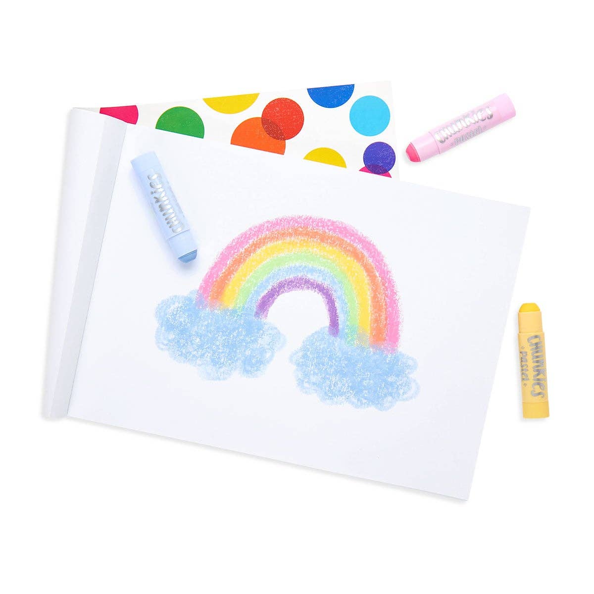 a picture of a rainbow drawn on a white piece of paper with the blue, pink and yellow pastel paint sticks.