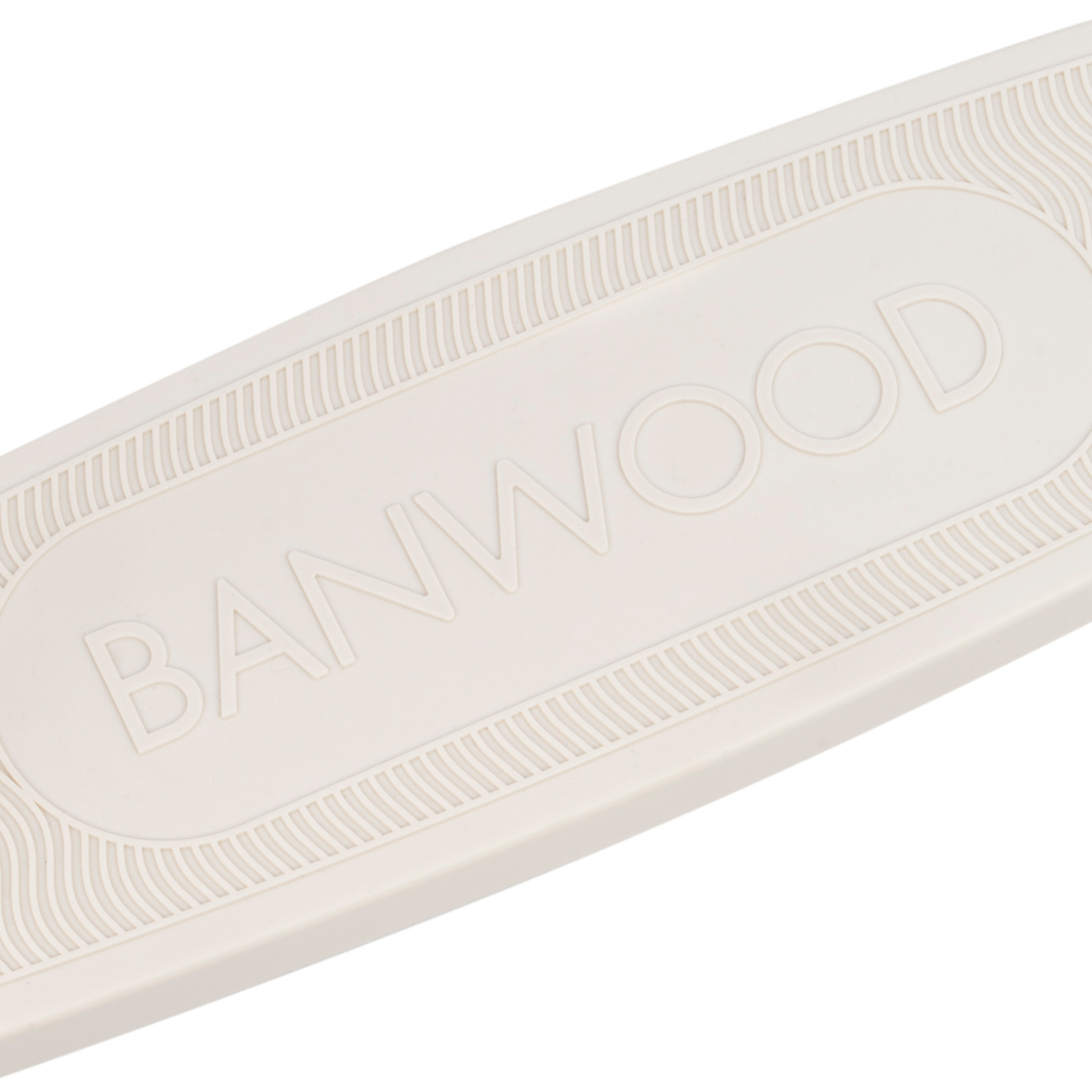 A close-up of an ivory eco-friendly scooter made from recycled plastic, featuring "BANWOOD" embossed prominently in the center, framed by a textured border.