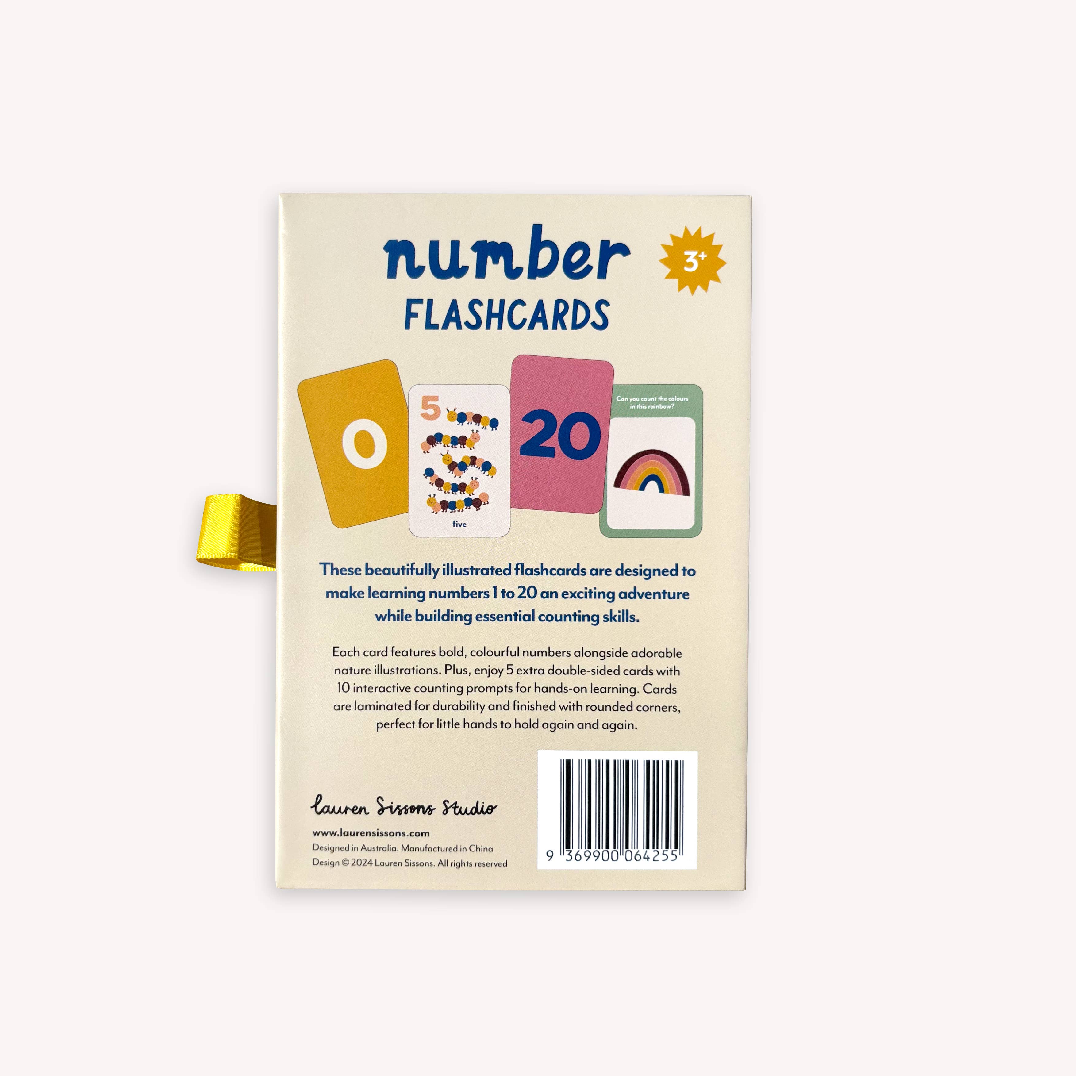 Back of a box of Lauren Sissons - Illustrated Number Flashcards from Lauren Sissons Studio, showing sample cards (0, 5, 20), descriptive text on building counting skills, branding, and a yellow ribbon pull tab on the left.