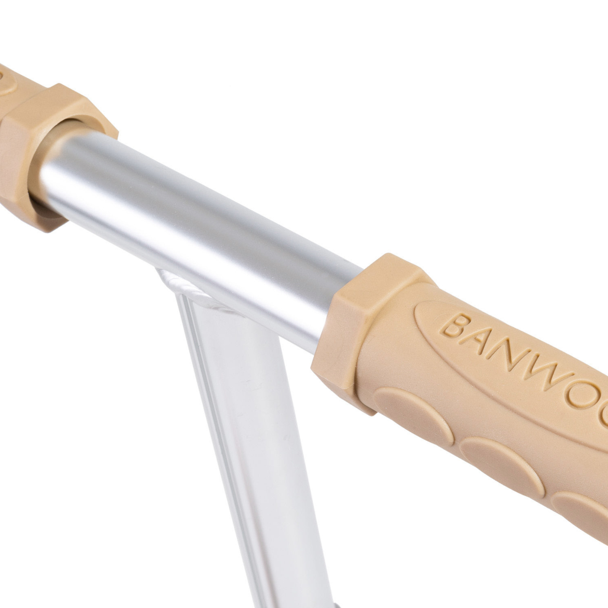 Close-up of a Banwood Eco Scooter Clay handlebar with beige rubber grips from recycled plastic, featuring textured lines and embossed "BANWOOD," set against a sleek, light-reflective silver frame that underscores the brand's sustainable commitment.