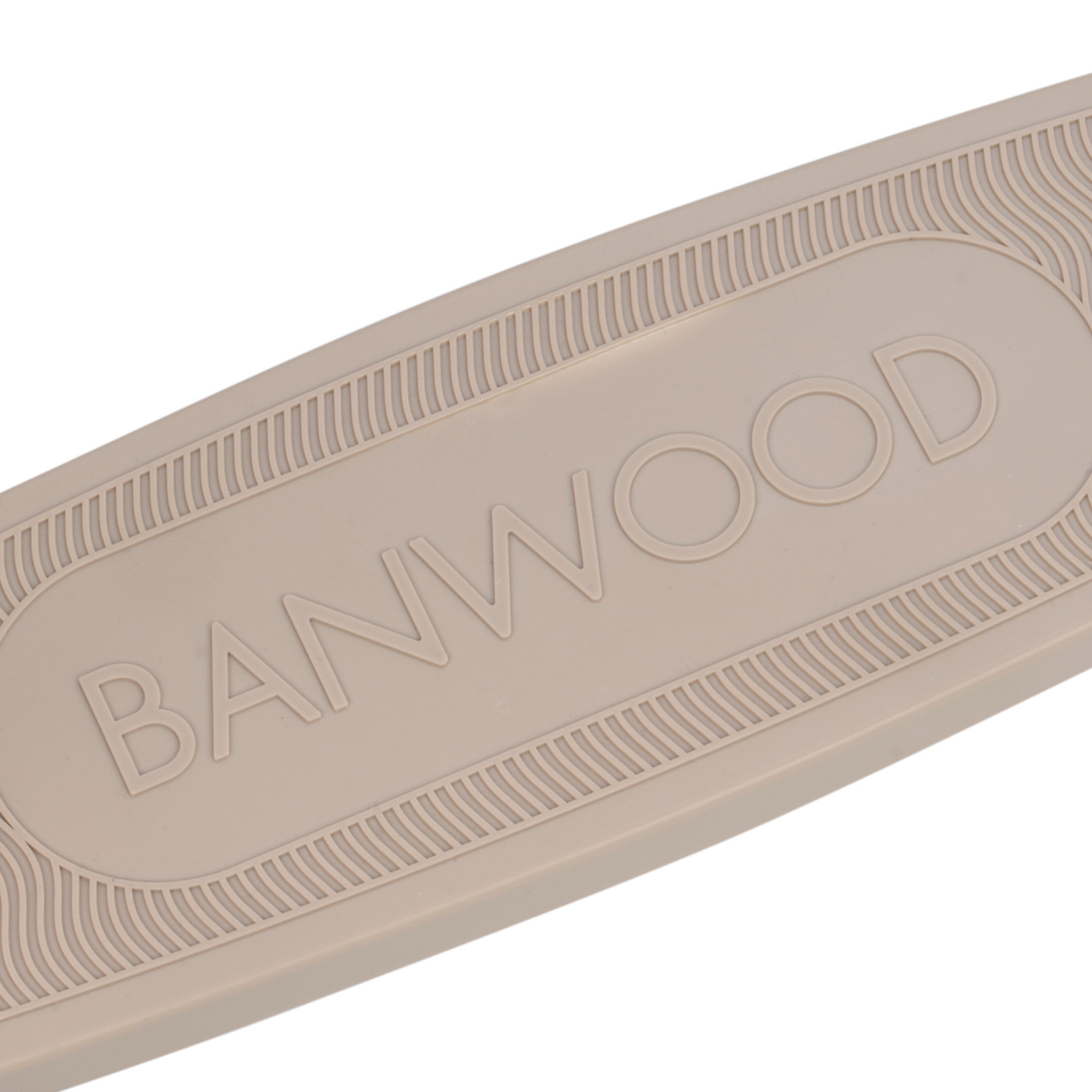 The Banwood - Eco Scooter Sand prominently displays the "BANWOOD" brand name at its center on a beige deck crafted from post-consumer recycled plastic, featuring ribbed edges for grip with a minimalistic, modern design.
