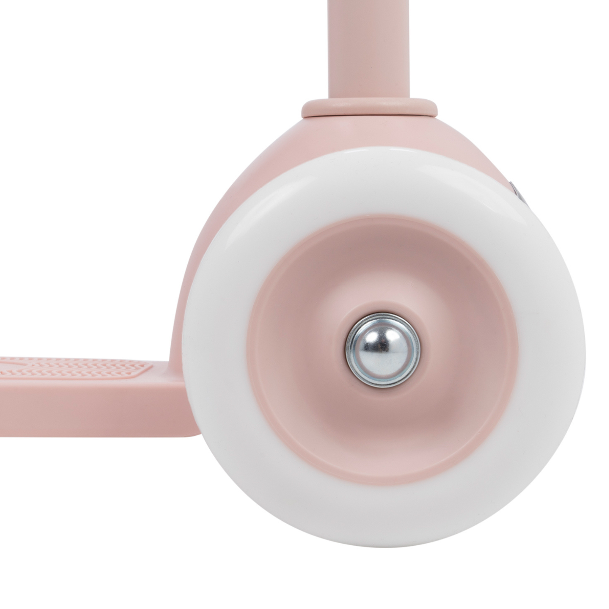 Close-up of the Banwood Eco Scooter Faded Pink's wheel with a white tire, showcasing its sustainably-crafted structure. The textured footrest and metal-centered wheel highlight BANWOOD's use of recycled plastic components.