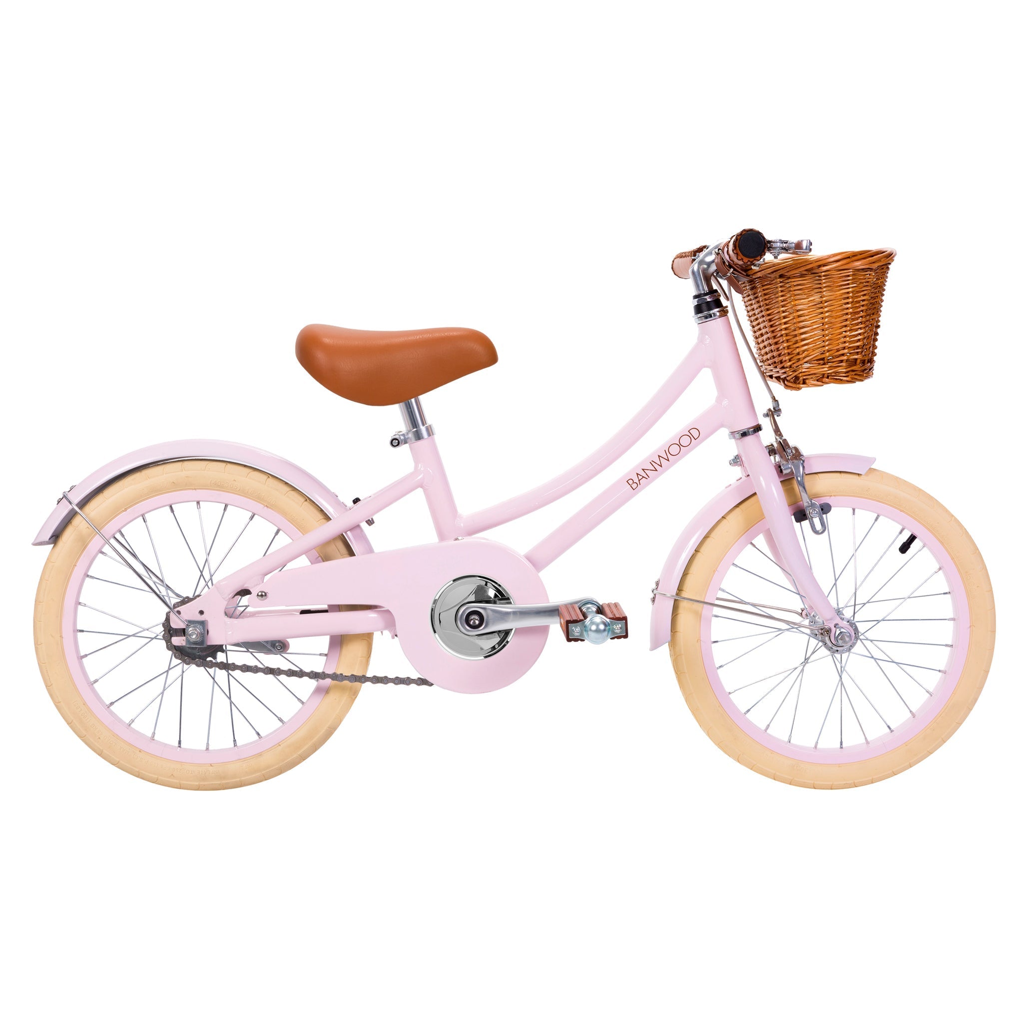 The Banwood - Classic Bicycle Pink by BANWOOD is a vintage-inspired children's bike featuring Scandinavian design elements. It has a brown seat, a wicker handlebar basket, cream tires, and a chain guard, all elegantly displayed on a white background.
