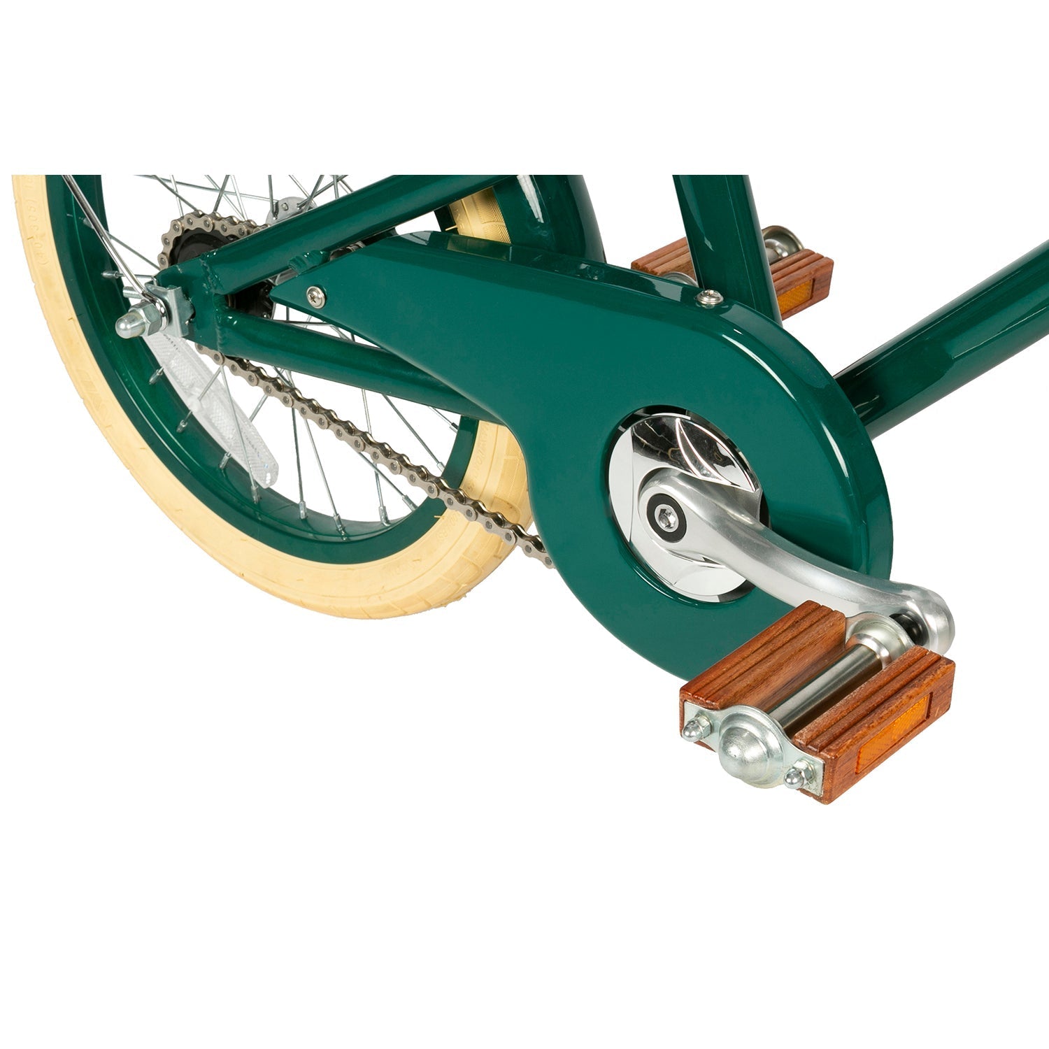 Close-up of the Banwood - Classic Bicycle Green by BANWOOD, highlighting the rear wheel and chain. The bike has a chain guard, light-colored tires, pedals with wooden treads, and a sleek classic frame design.