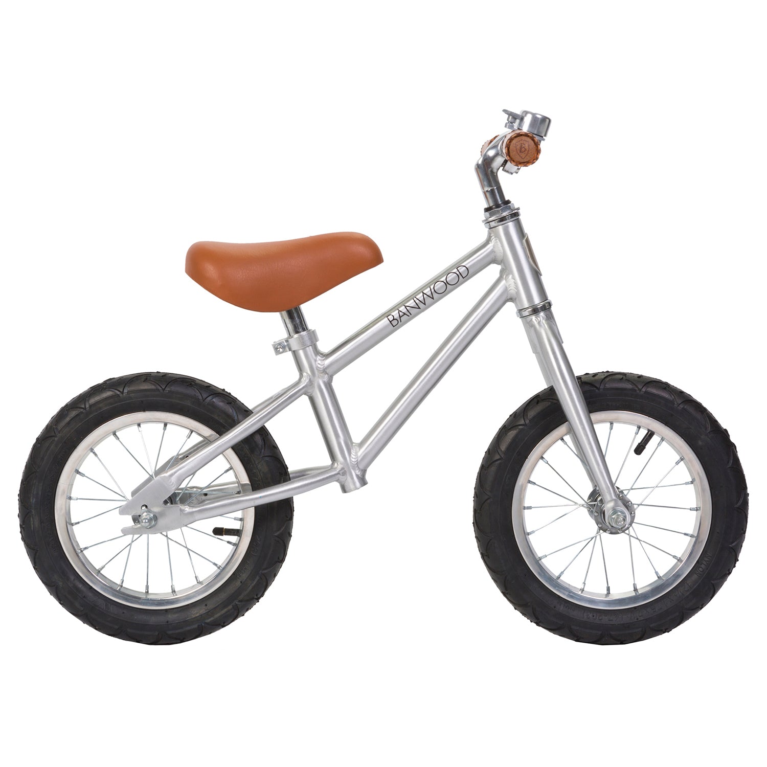 The Banwood - Vintage Balance Bike Chrome by BANWOOD is a vintage-styled children's bike featuring a shiny silver frame, brown leather seat, and matching bell. Designed for beginners, it offers black tires ideal for young riders to practice balance.