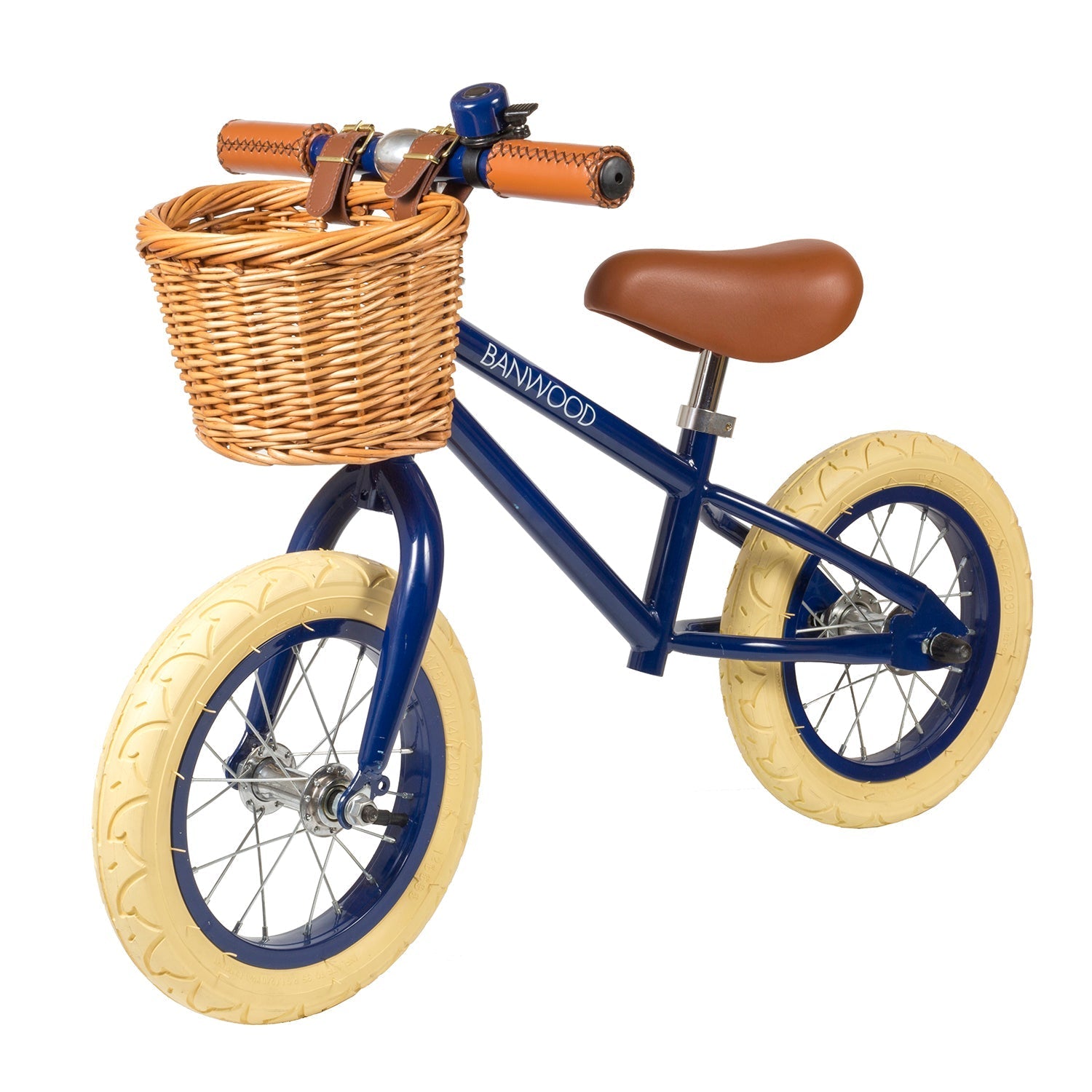 The BANWOOD Vintage Balance Bike in Navy Blue features a vintage style for children, complete with a brown leather seat, handle grips, and a charming woven basket on the handlebars. It has cream-colored tires, perfect for young adventurers discovering cycling.