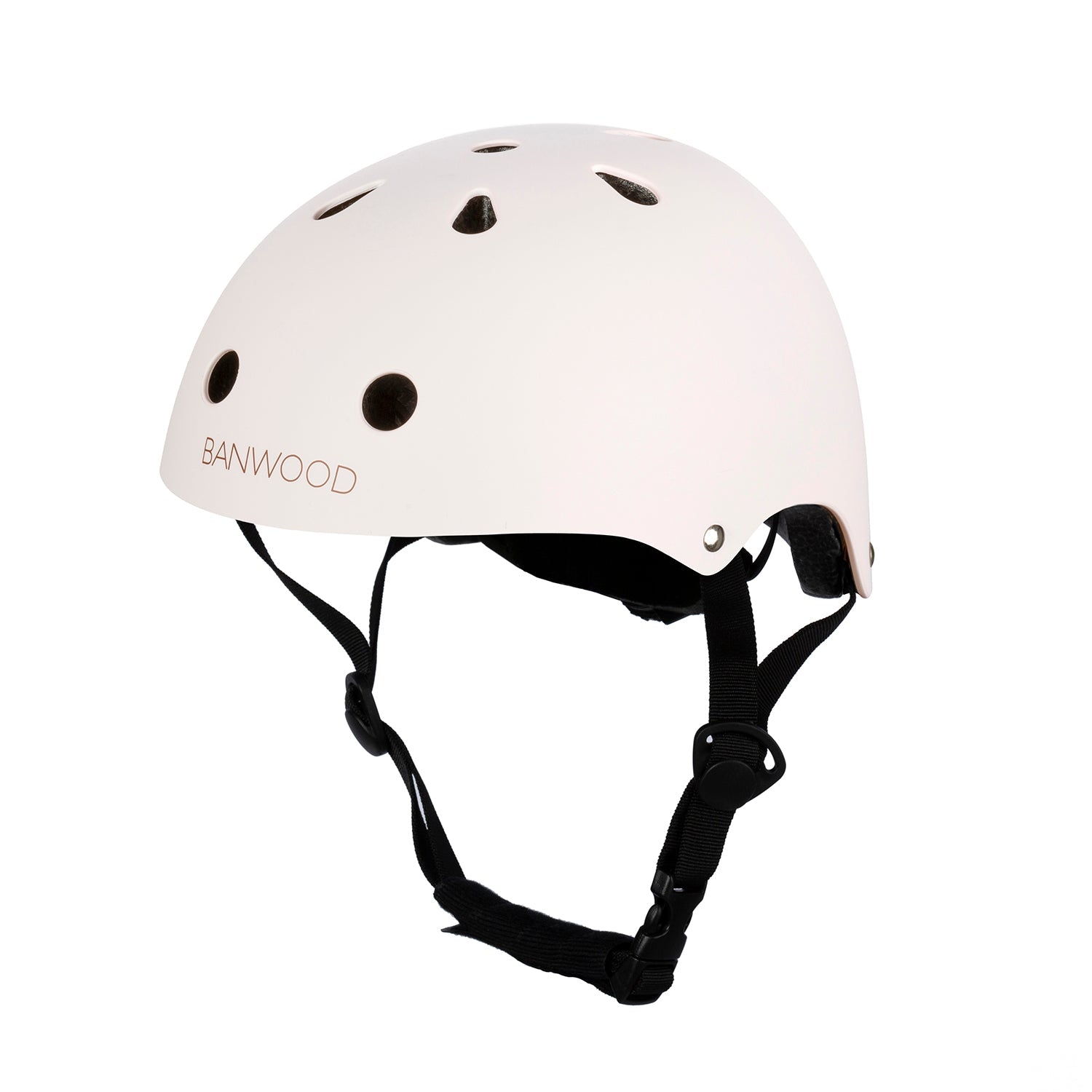 A Banwood Classic Helmet Pink - S, designed for children with a matte pink finish and adjustable black straps, features ventilation holes and rests on its side. "BANWOOD" is prominently printed on the front.