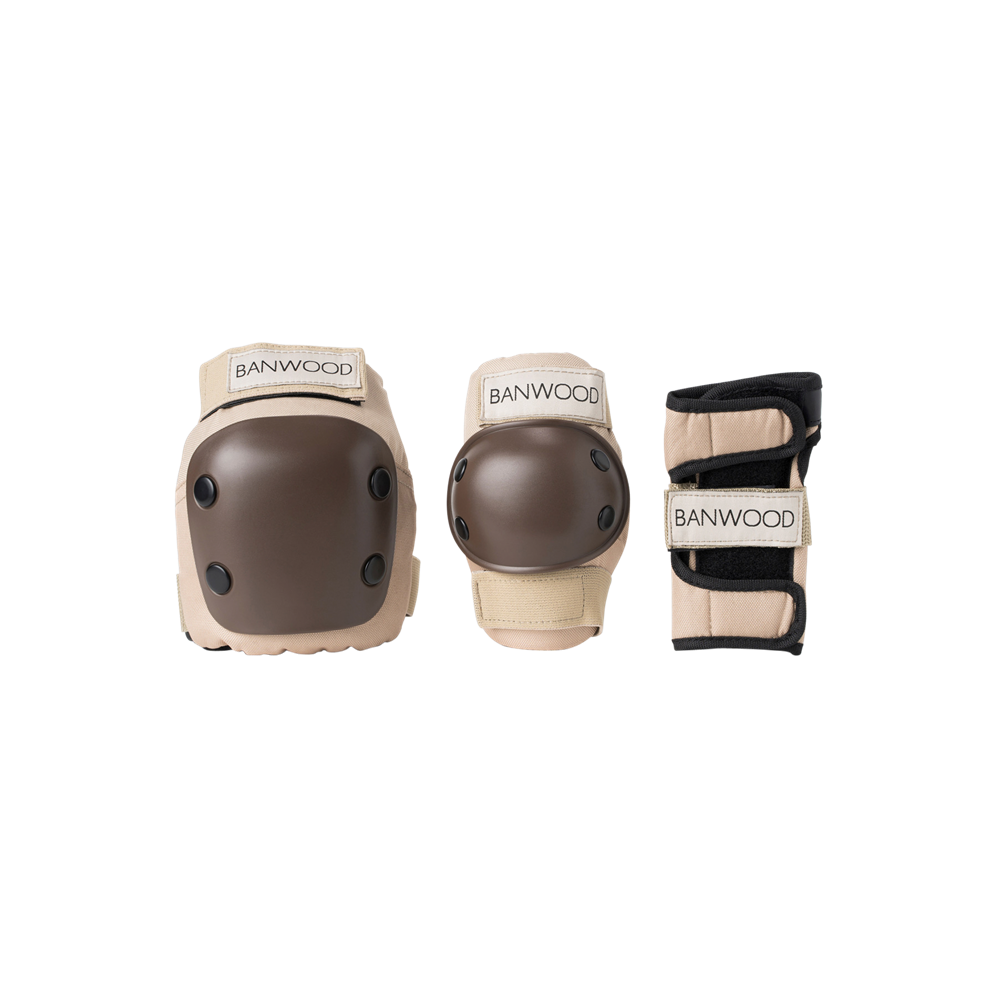 Experience top safety with the Banwood Skateboard Protective Gear in tan/brown for skating or cycling. Includes two knee pads and one wrist guard, each branded with "Banwood" to guarantee quality and style.
