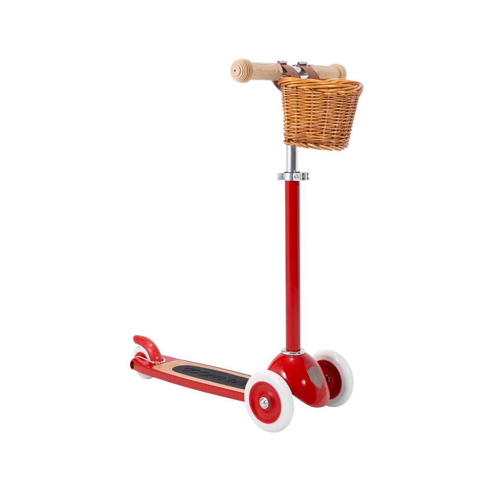 The Banwood - Scooter Red by BANWOOD is a stylish kids' three-wheeler with an adjustable handlebar, charming wicker basket, beige grips, and white wheels. It's designed for an Easy Ride Steering System experience and photographed on a plain white background.