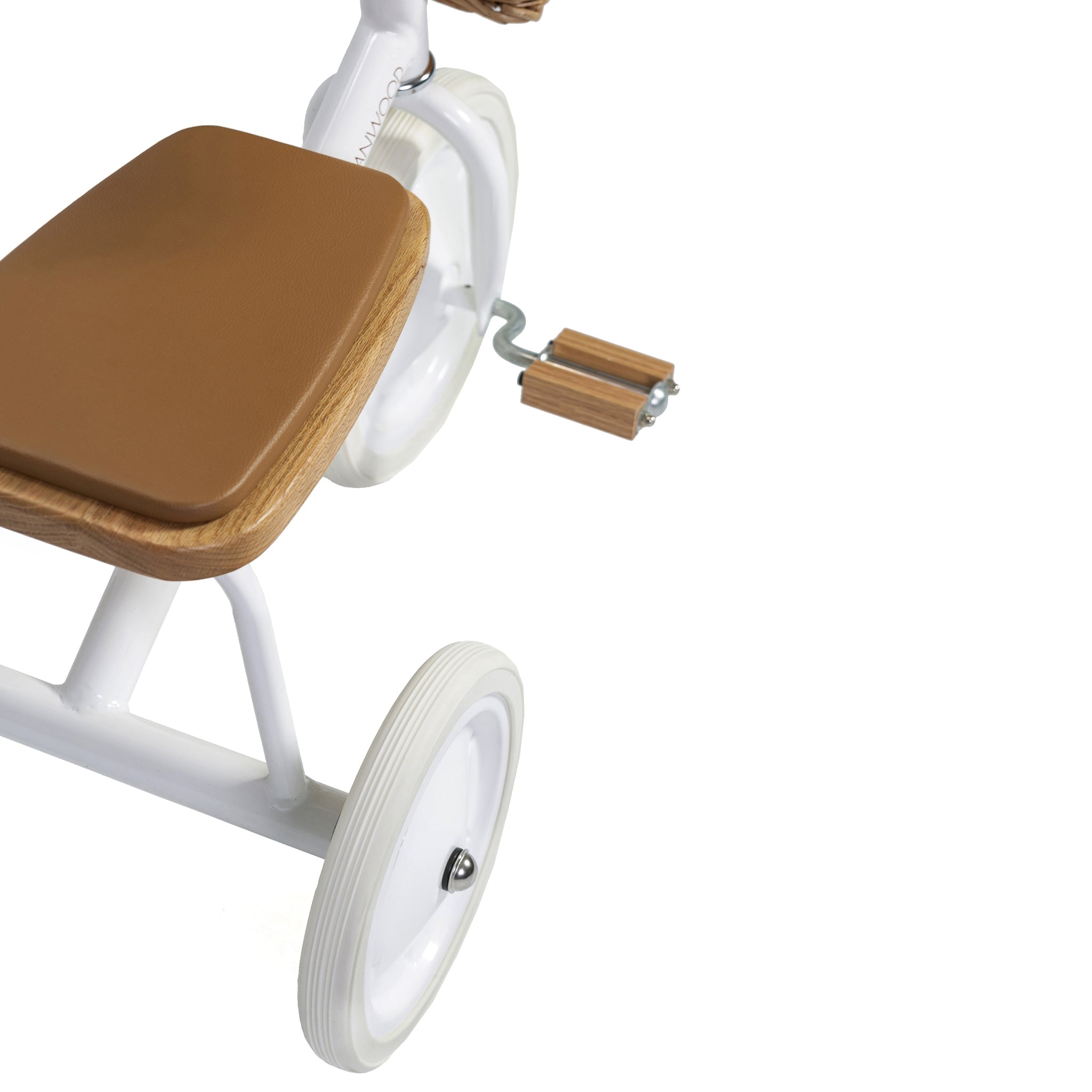 The Banwood - Trike White by BANWOOD is a minimalist tricycle for kids featuring a white metal frame, wooden seat and pedals, and white wheels. Its simple design blends modern and classic aesthetics against a white background.