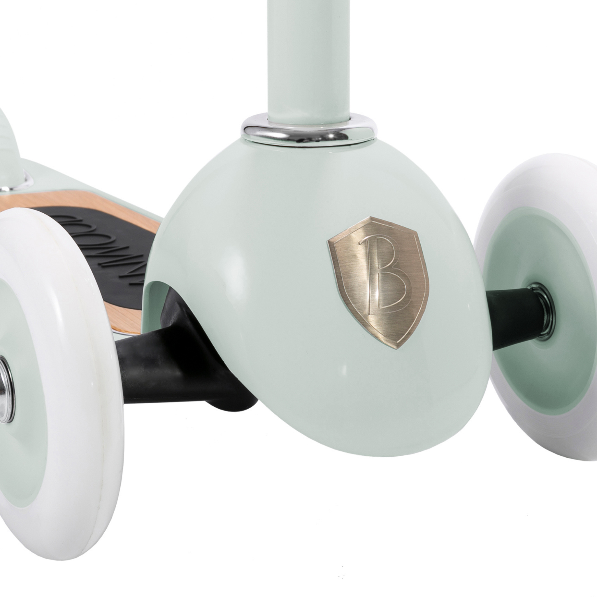 The Banwood - Scooter Mint by BANWOOD is a light green, three-wheel kick scooter with white wheels, a black footboard, and a metallic "B" emblem on the front. It features a retro design and an Easy Ride Steering System for enhanced balance and coordination.