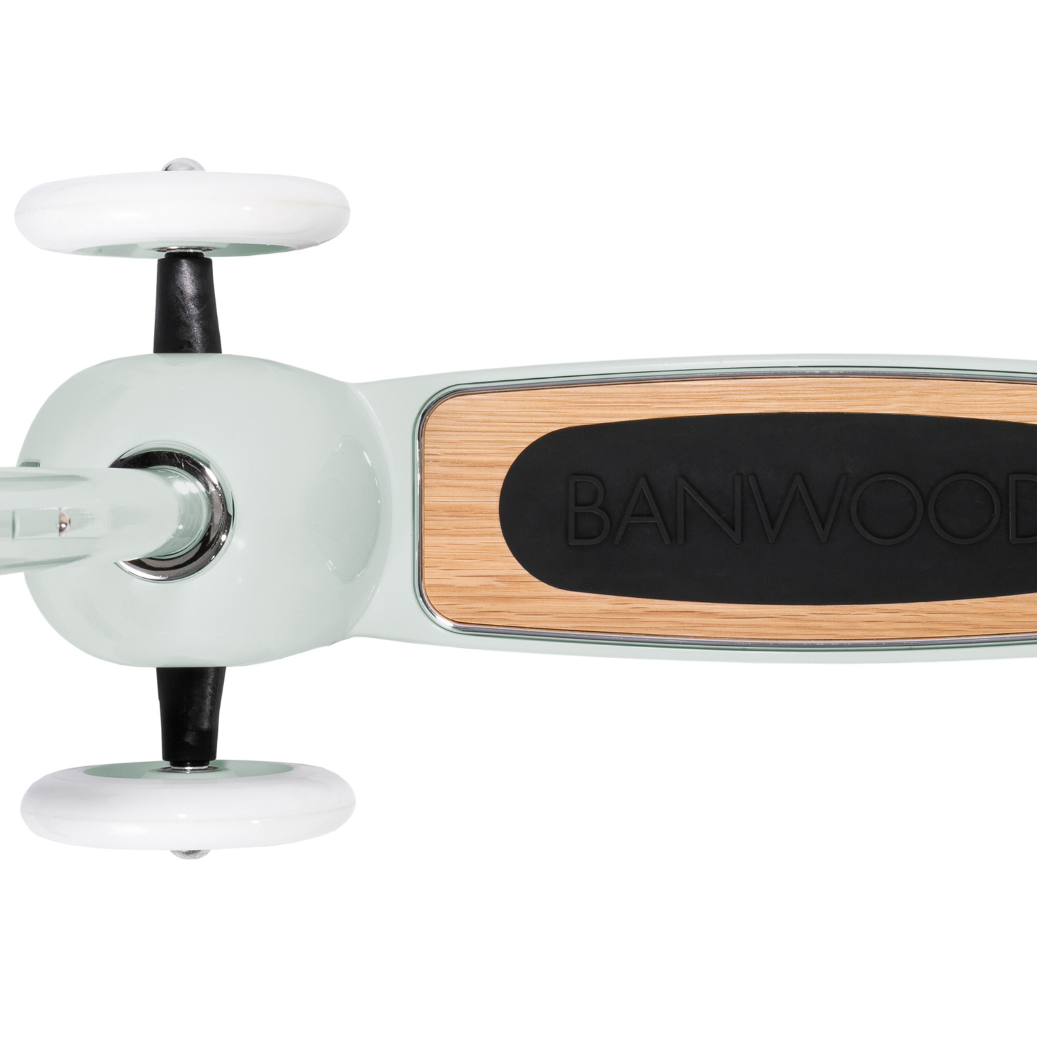 A top view of the Banwood - Scooter Mint, featuring a pastel green retro design with a "BANWOOD" wooden platform and white wheels. Its sleek and minimalistic aesthetic, coupled with the Easy Ride Steering System, provides kids a stylish look and smooth ride.