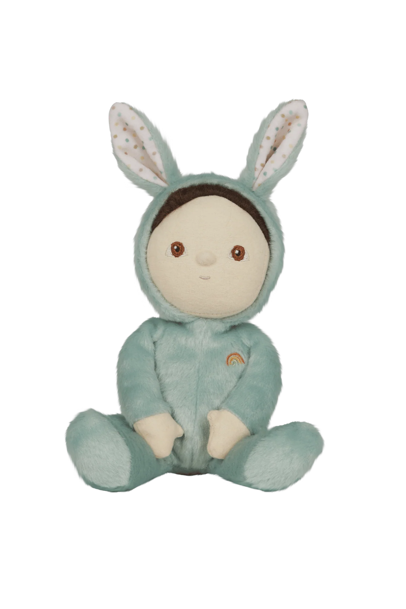 Meet the OLLI ELLA Dinky Dinkum Biscuit Bunny, a plush toy in a teal bunny costume with long ears and a white polka-dot underside, brown eyes, and a subtle smile. Its outfit is embellished with an embroidered rainbow for added charm.