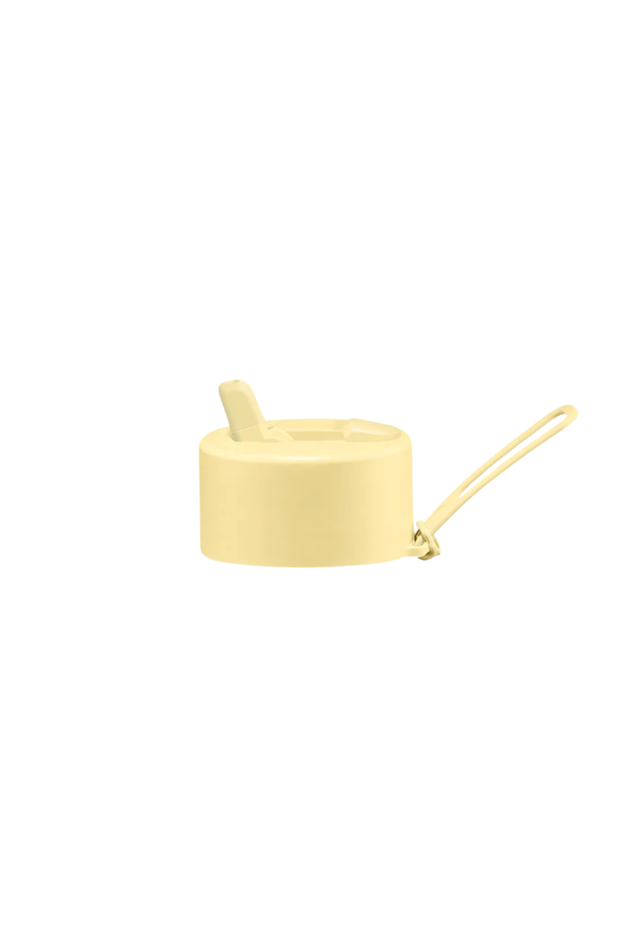 The FRANK GREEN Flip Straw Lid Buttermilk is displayed, featuring a yellow lid with a closed drinking spout and an attached strap. Its circular design includes a silicone mouthpiece for comfortable sipping and easy pouring against a plain background.