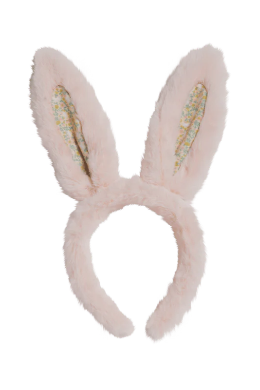 Add playful fun to your look with the Olli Ella ~ Fluffle Bunny Ear Headband Pink by OLLI ELLA, featuring soft, fluffy material and tall, light pink ears with a charming pastel floral pattern inside.