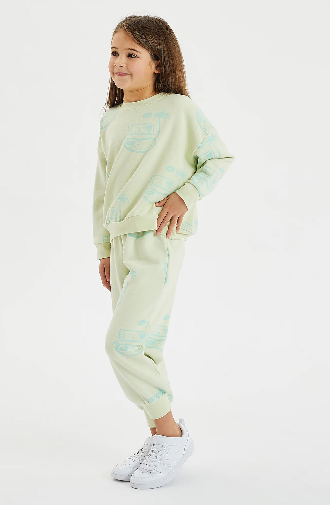 Girl standing on the side showing the pool house fleece track pant