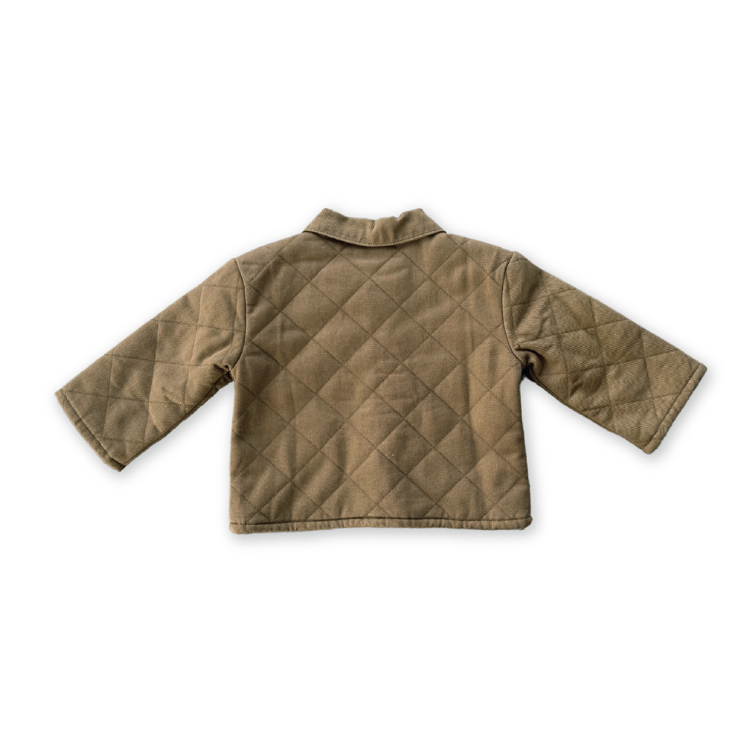 The GROWN Organic Quilted Denim Jacket Coffee, featuring long sleeves and a collar, is shown flat with the back facing up against a black background.