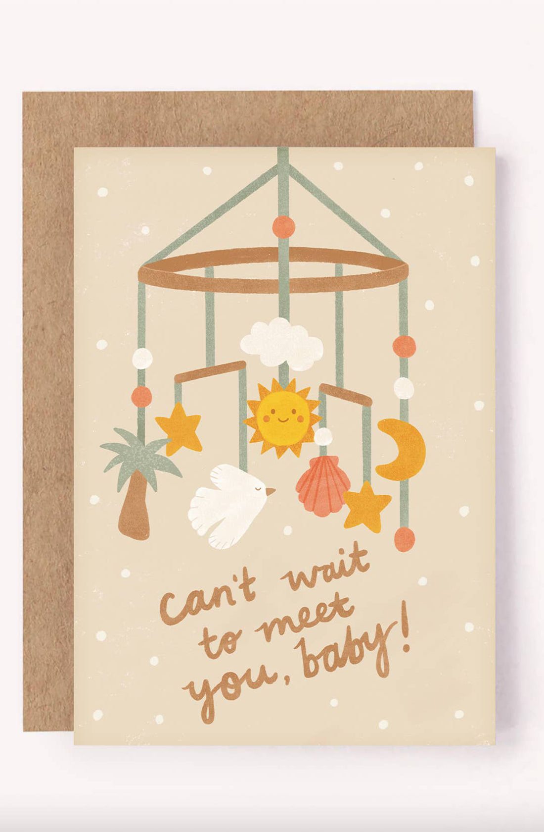 The Baby Shower Greeting Card "Can't Wait to Meet You Baby" by LAUREN SISSONS STUDIO is a gender-neutral card featuring a charming illustration of a baby mobile with a palm tree, cloud, sun, dove, seashell, star, and moon. The text reads, "Can't wait to meet you, baby!" It makes for an excellent sustainable baby card option and comes with a brown envelope.