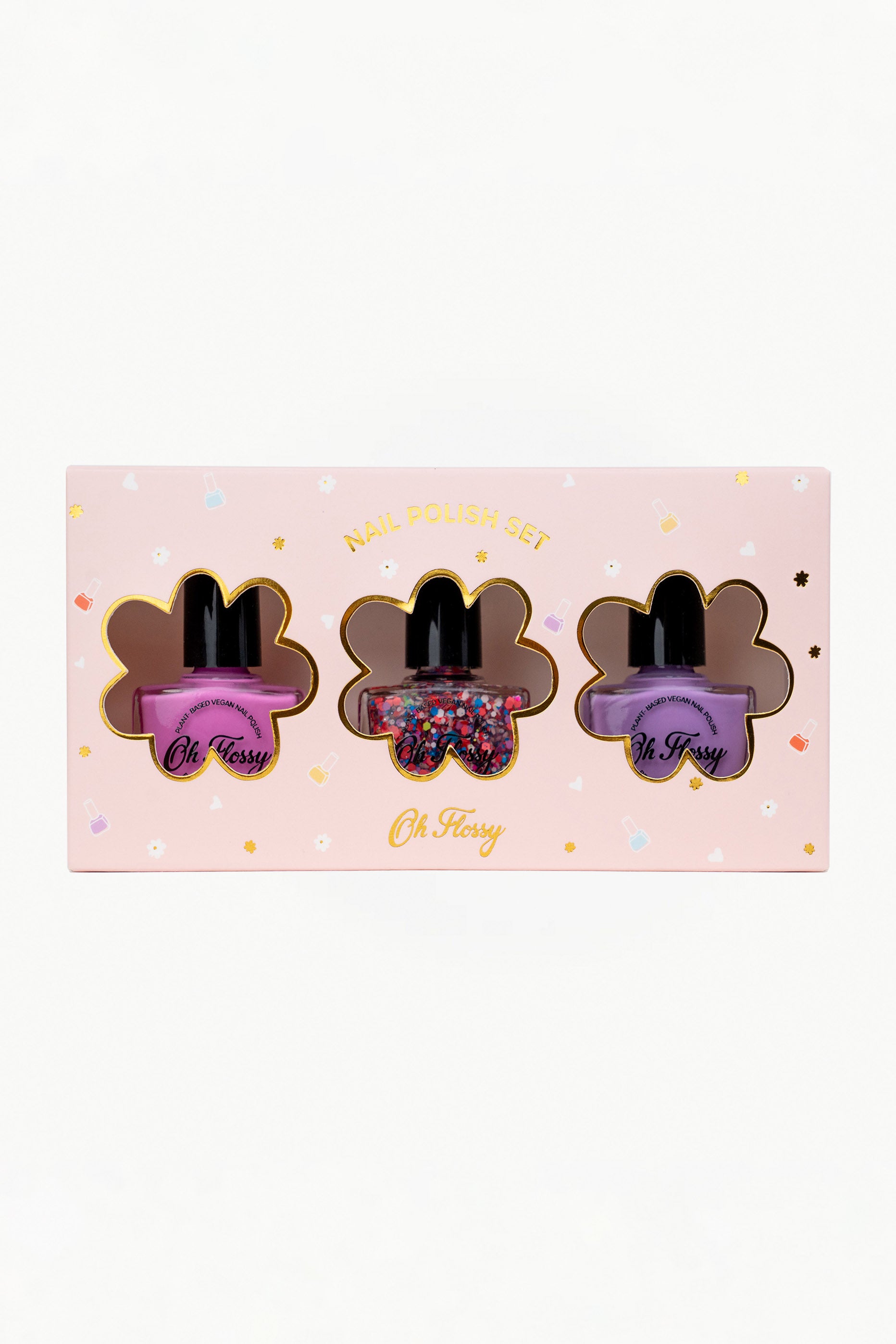 The Oh Flossy ~ Party Nail Polish Set by OH FLOSSY in a pink box with floral cutouts includes three bottles: bright pink, glittery multicolor, and soft purple. Decorated with stars and dots, this vegan-friendly, plant-based collection is safe and stylish for kids.