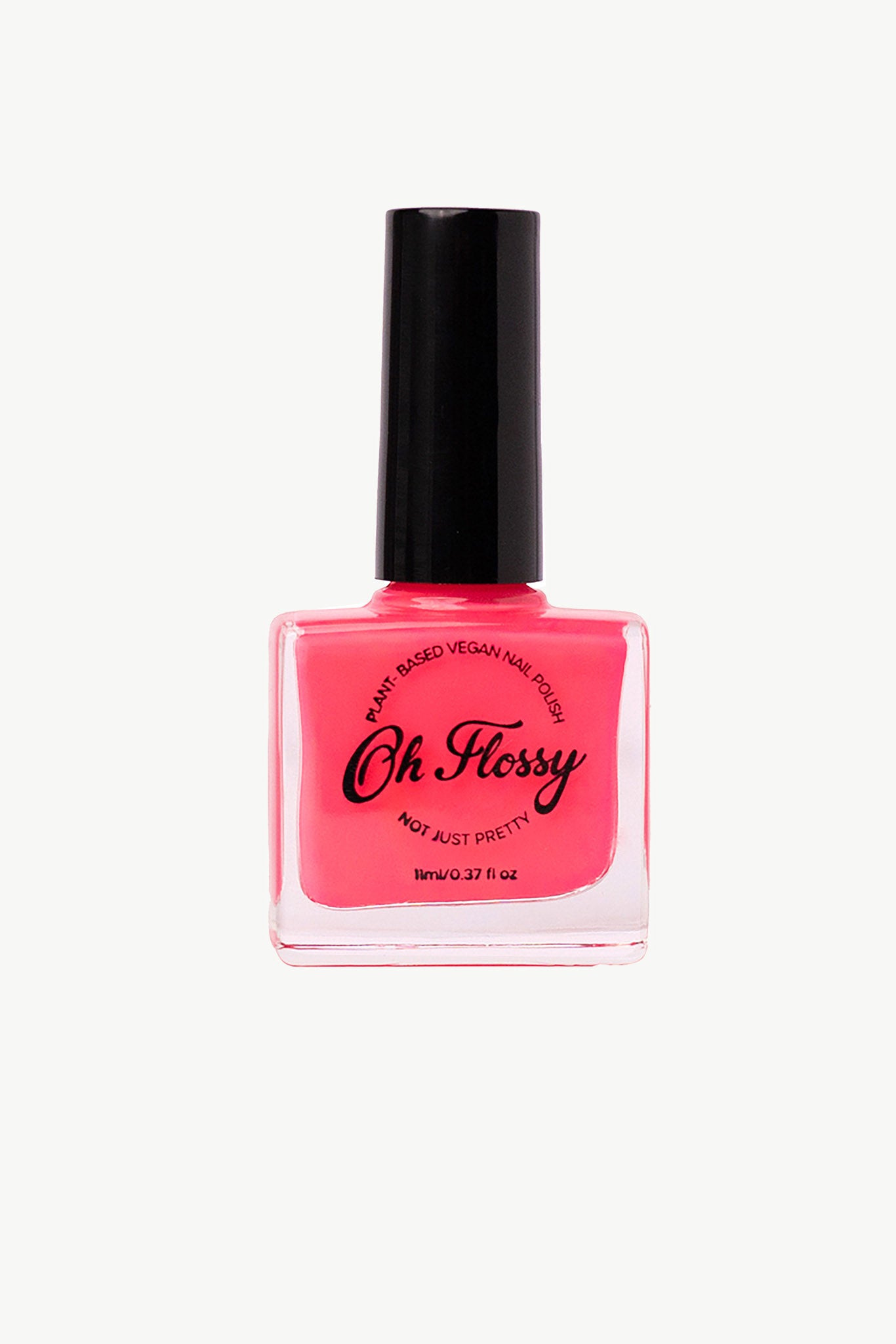 The Oh Flossy ~ Nail Polish Hot Pink by OH FLOSSY features a quick-dry, plant-based, vegan formula ideal for kids. The bright pink bottle with a black cap says "Not Just Pretty" and contains 0.37 fl oz.