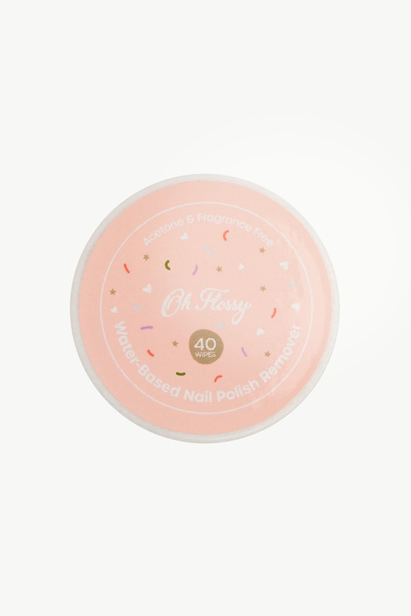 The round container of Oh Flossy ~ Water-Based Nail Polish Remover Wipes features a vegan formula. A pink lid with white text highlights its acetone and fragrance-free nature, decorated with multi-colored sprinkles. Made in Australia, it prominently displays "40 Wipes" at the center.