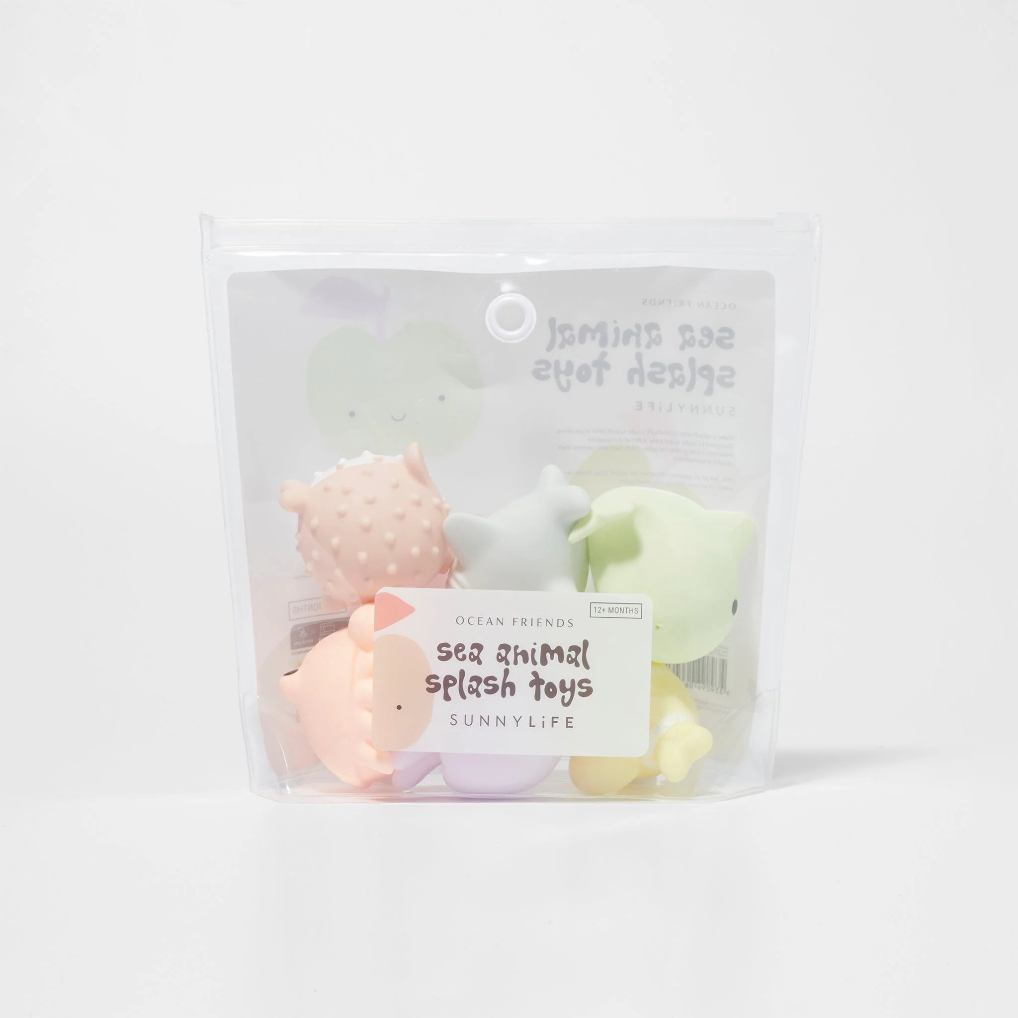 A transparent plastic package from SUNNYLIFE contains pastel-colored, floating sea animal-shaped splash toys. Inside the "Sea Animal Splash Toys" set, you'll find a starfish, fish, and dolphin—perfect for splash play.