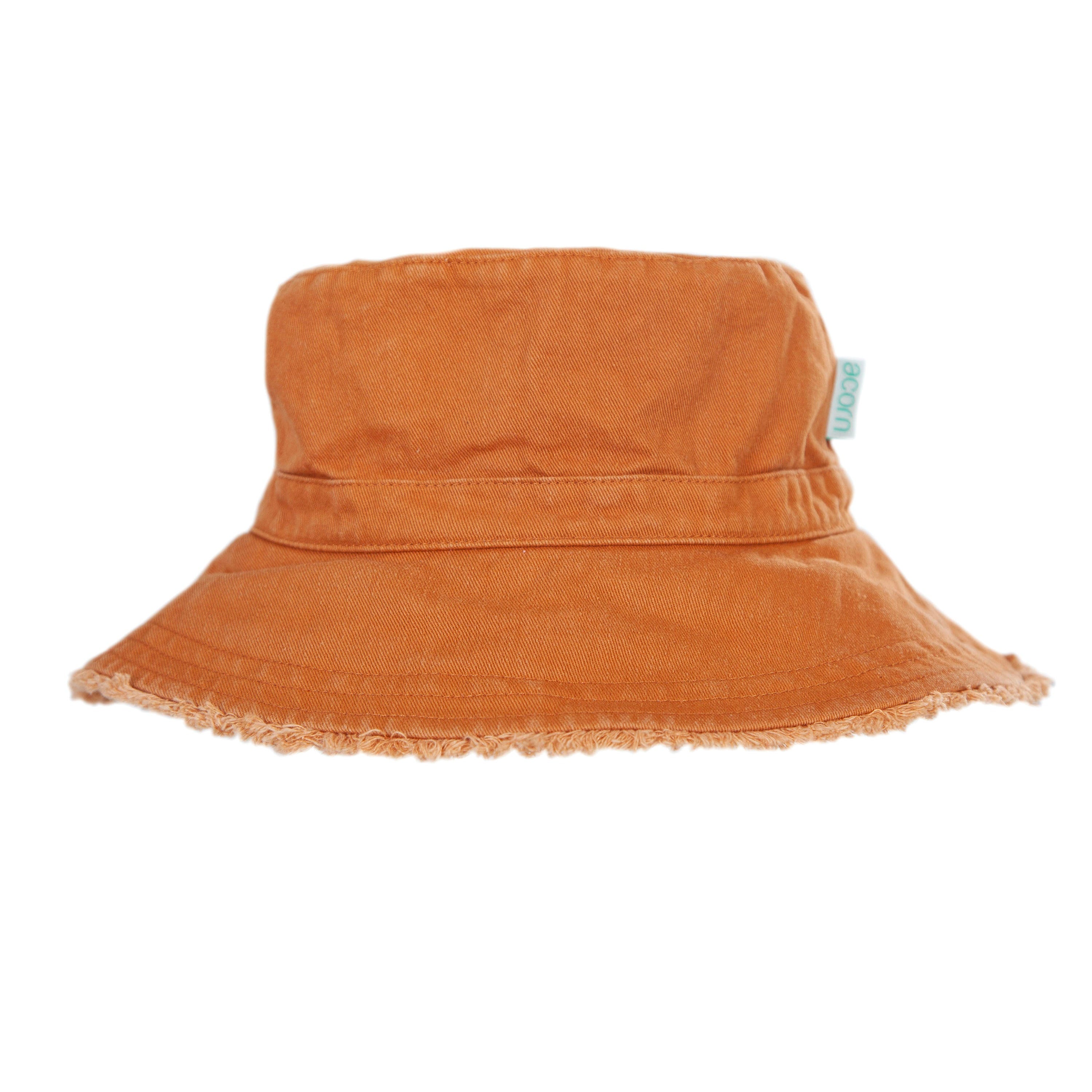 The Frayed Bucket Hat Chestnut from ACORN KIDS is a lightweight cotton twill hat with an orange hue, featuring a wide, slightly frayed brim and offering UPF50+ sun protection. Its casual design makes it perfect for sunny weather, and a small tag is visible on the side.