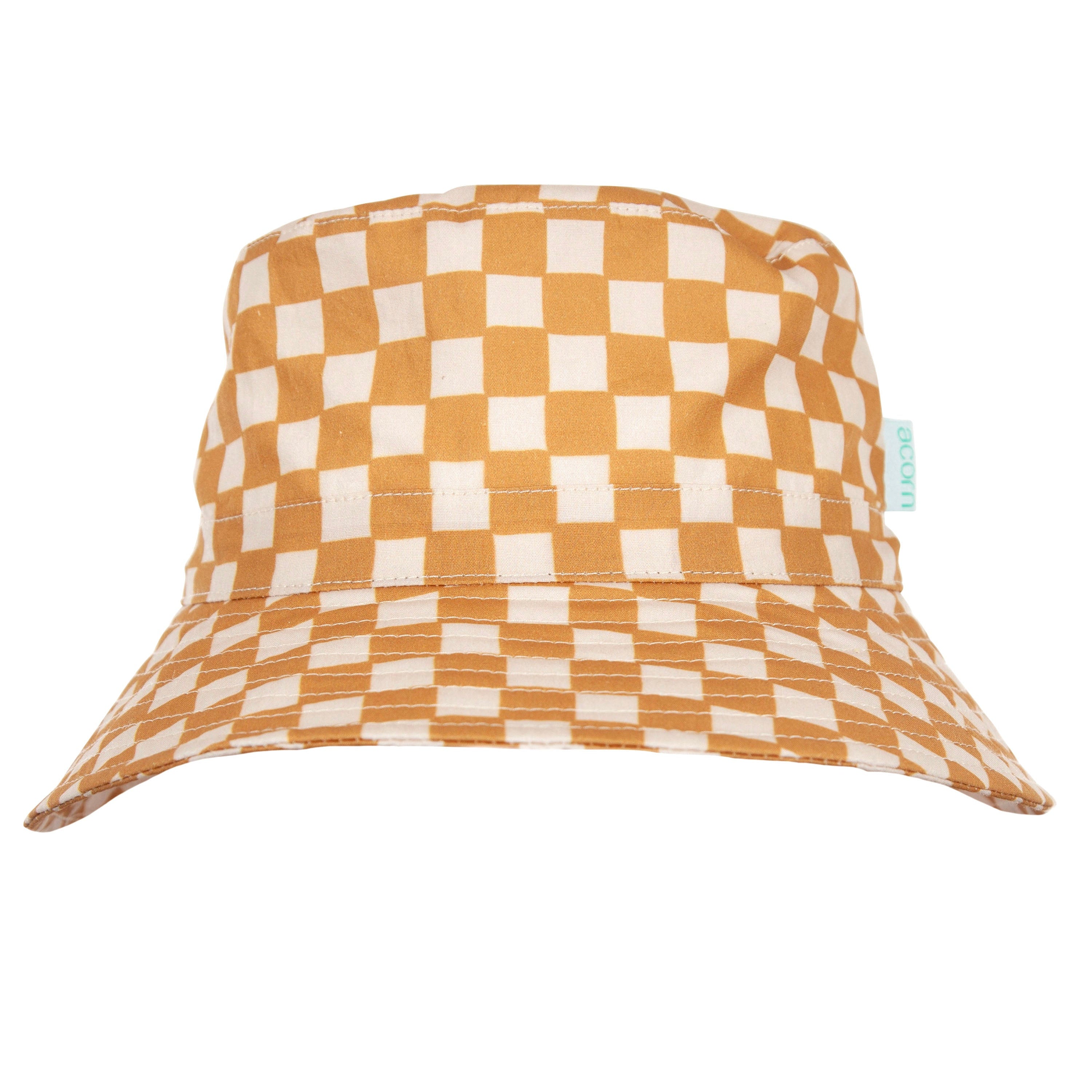The ACORN KIDS Checkmate Wide Brim Bucket Hat features a stylish caramel and cream check pattern, a flat top, and a wide brim. A small green tag on the side adds a touch of flair, while UPF50+ sun protection keeps you safe on sunny days.