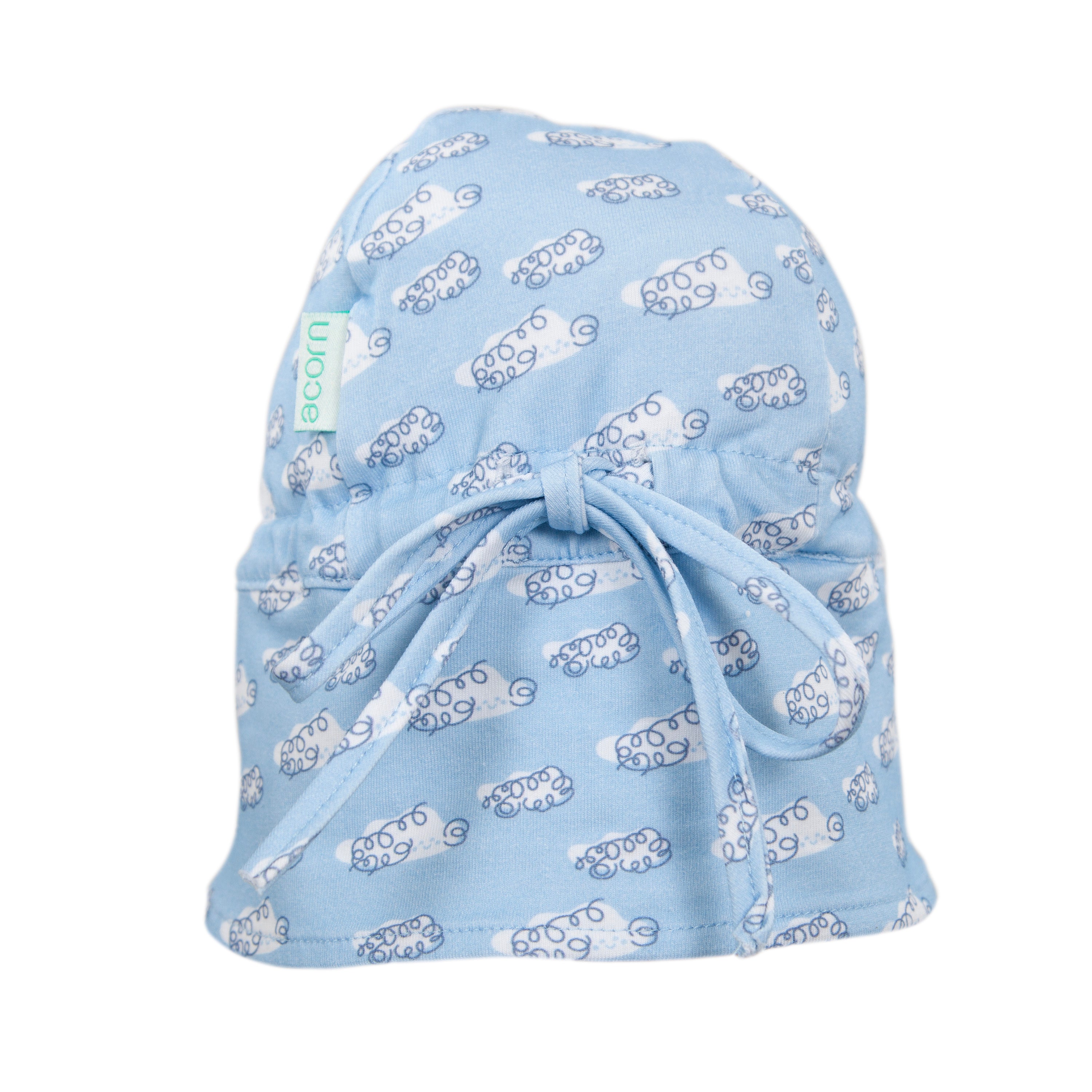 The Acorn Kids - Clouds Flap Hat by ACORN KIDS is a light blue cotton jersey baby cap with a white car pattern, blue wheels, side green tag, back bow, and UPF50+ sun protection.