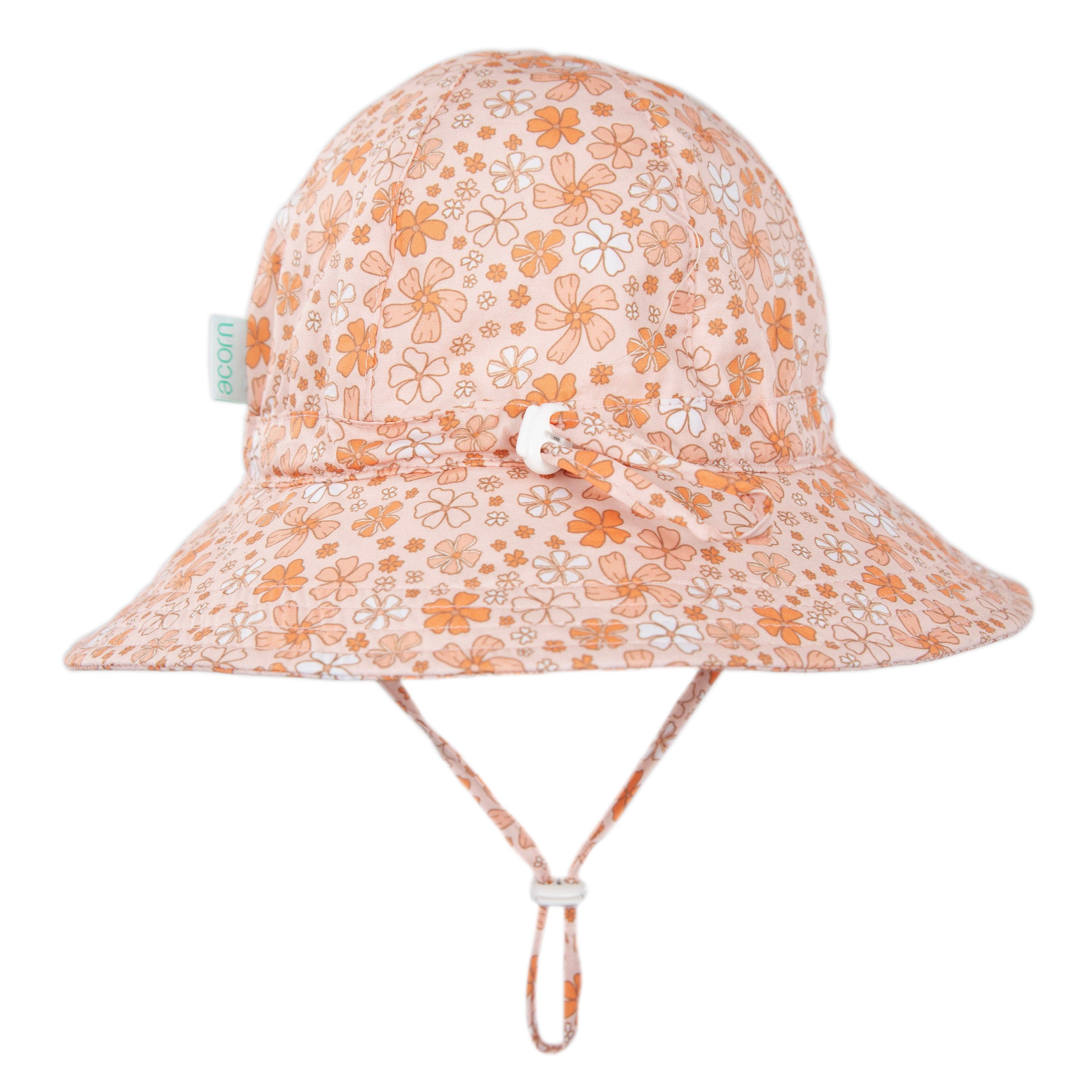 The ACORN KIDS Lulu Wide Brim Sunhat is peach-colored with a vintage floral print, decorative bow, adjustable chin strap, and UPF50+ protection—perfect for stylish outdoor days.