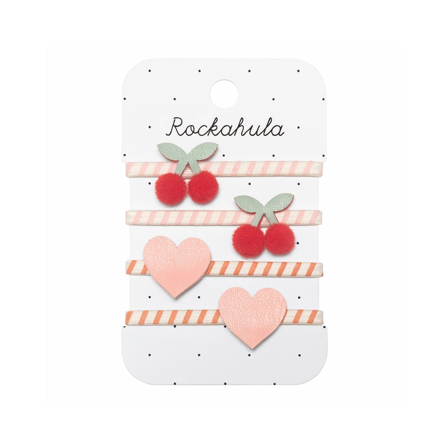 The Rockahula - Stripy Cherry Ponies by ROCKAHULA includes four decorative hair clips—two with red pom pom cherries and green recycled felt leaves, and two with pink hearts, all on a white, spotty card.