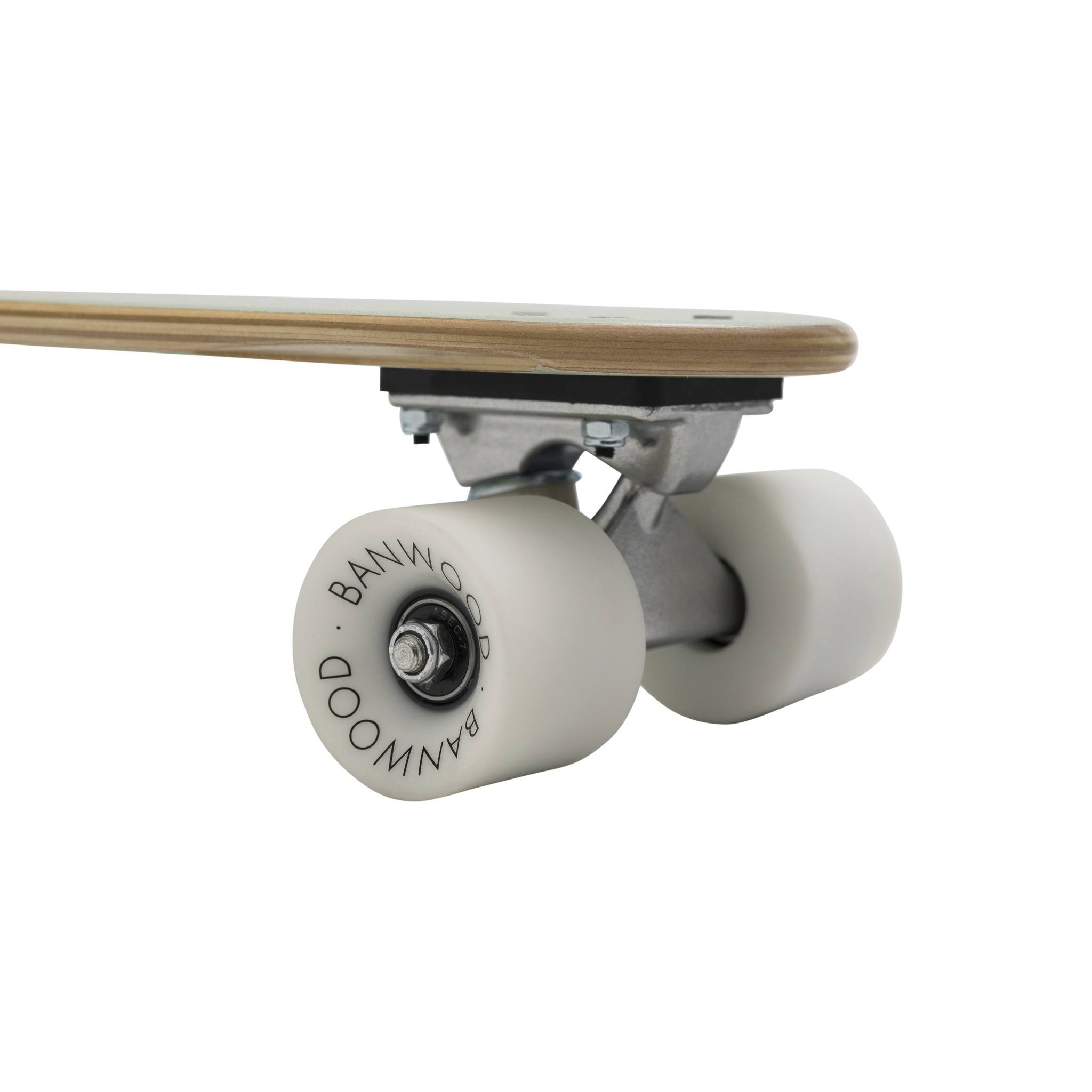 Close-up of a Banwood - Skateboard Pale Mint wheel and trucks. The white wheel marked "BANWOOD" complements the elegant Canadian Maple wooden deck. Metal trucks seamlessly connect the parts against a light gray background.