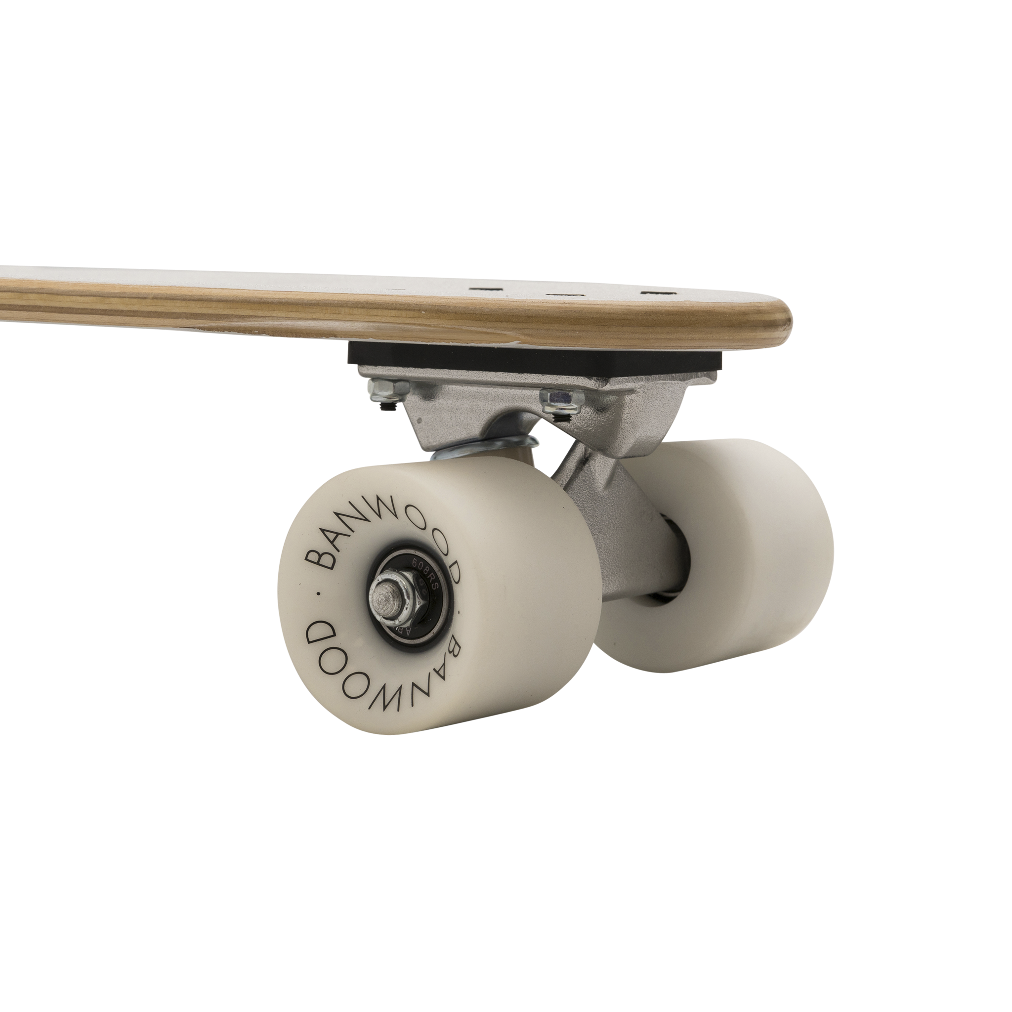 Close-up of Banwood's "BANWOOD" printed white skateboard wheel and trucks, showcasing its vintage elements like the natural wood finish underside made from Canadian Maple in a classic side view. Product: Banwood - Skateboard White by BANWOOD.