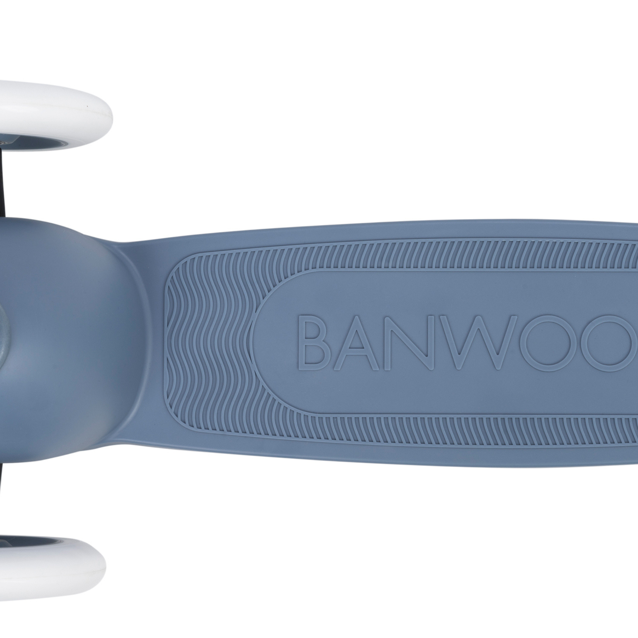 A close-up of the Banwood - Eco Scooter Deep Sea deck reveals a textured grip with "BANWOOD" embossed on it. Part of the front wheel and handlebar in matching blue with white accents is seen, highlighting its sustainable design made from recycled plastic.