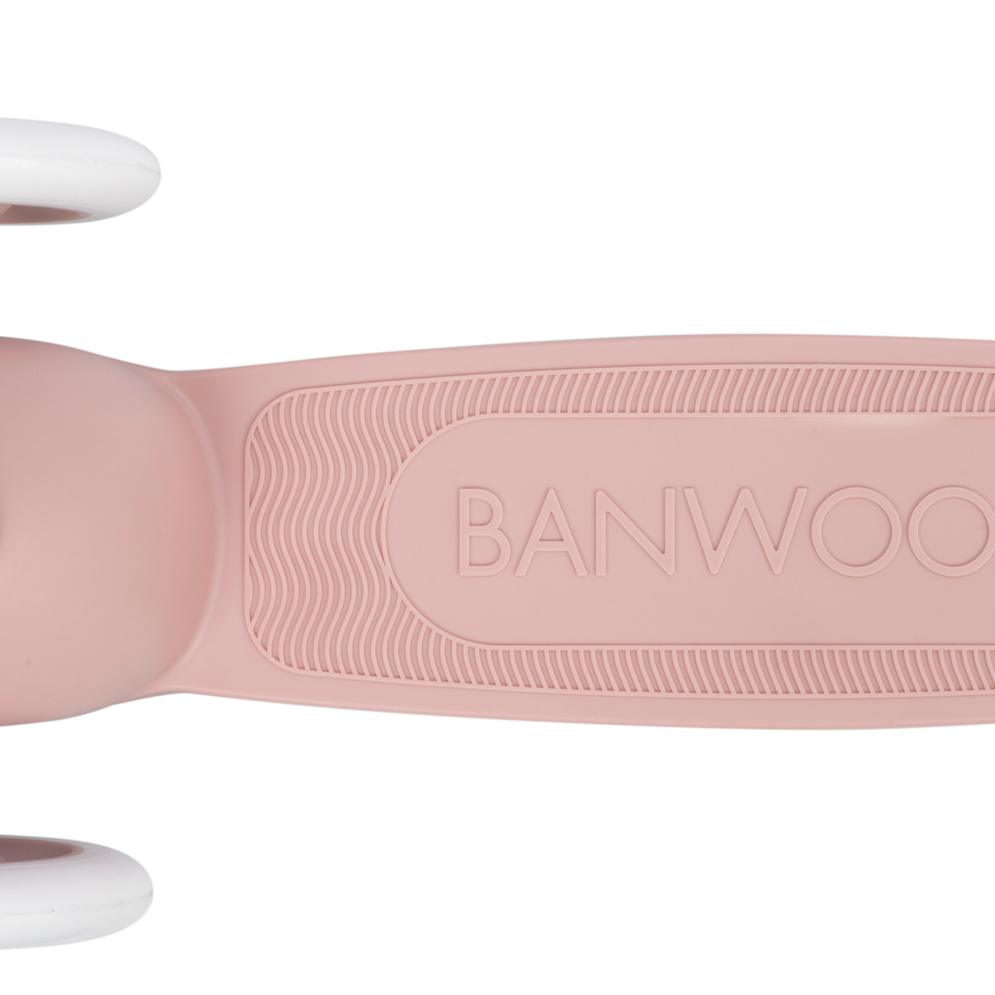 Close-up of a Banwood Eco Scooter Dusty Rose deck, made from recycled plastic, with "BANWOOD" embossed on it. The textured surface ensures grip, and the white wheel edges are partially visible at the top corners.