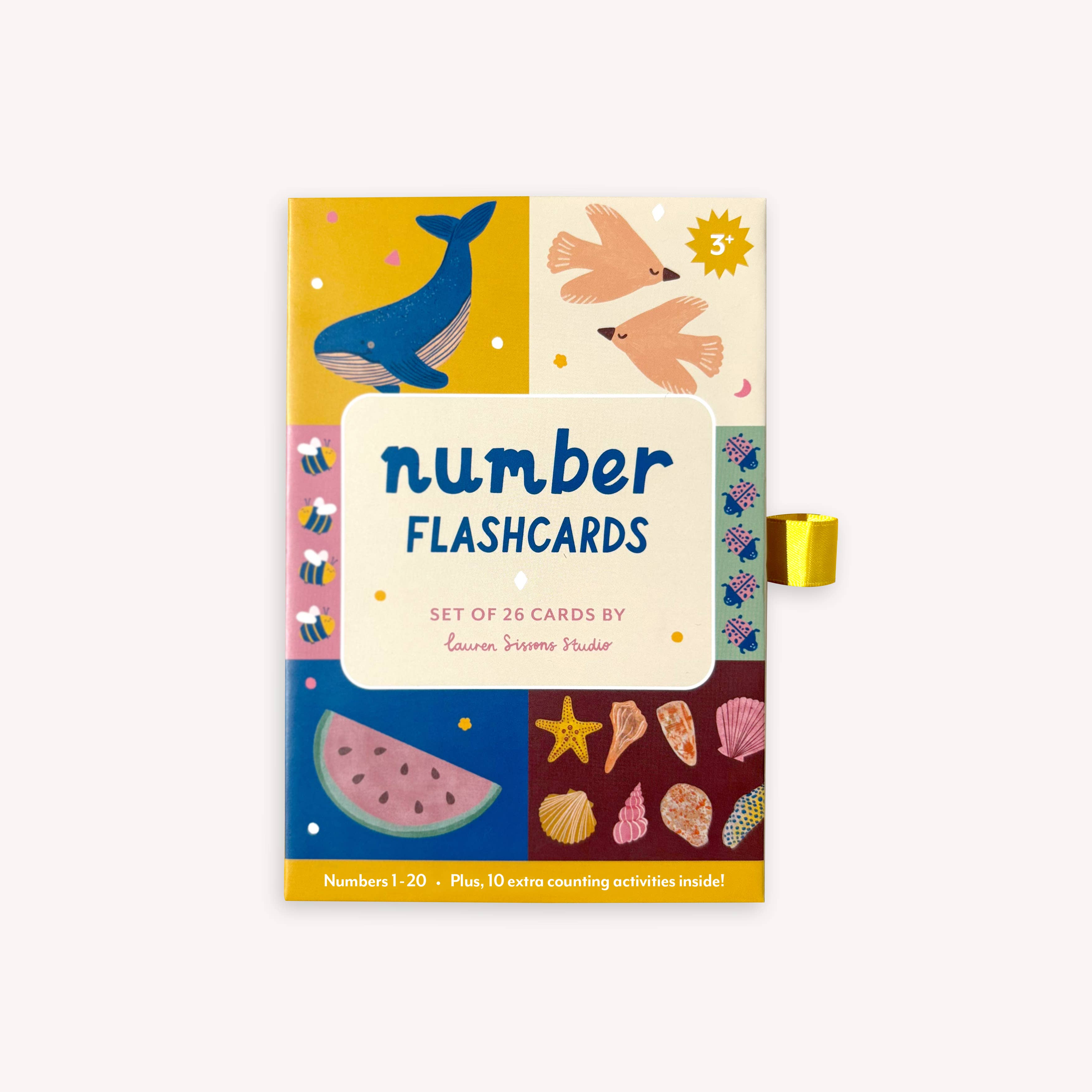 Lauren Sissons Studio’s "Illustrated Number Flashcards" set includes 26 cards featuring numbers 1–20 and playful illustrations like whales, birds, watermelon, and seashells to encourage counting skills through fun activities.