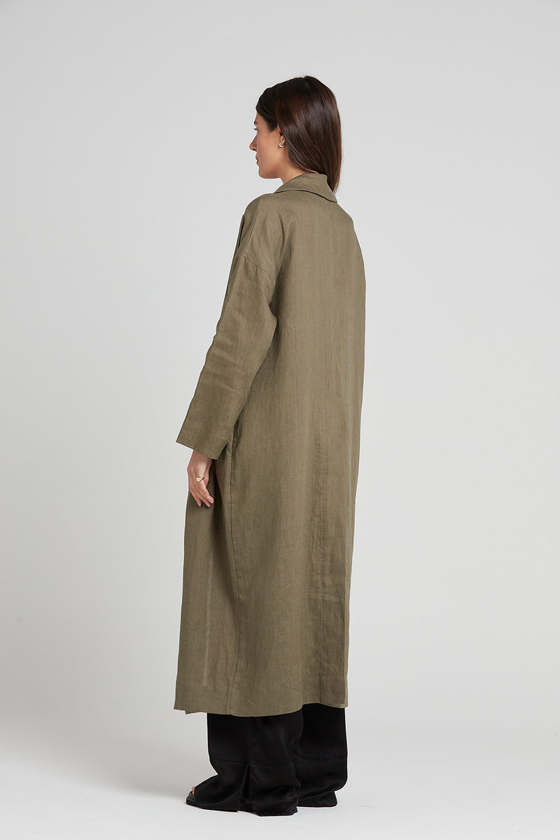 Woman wearing coat back view