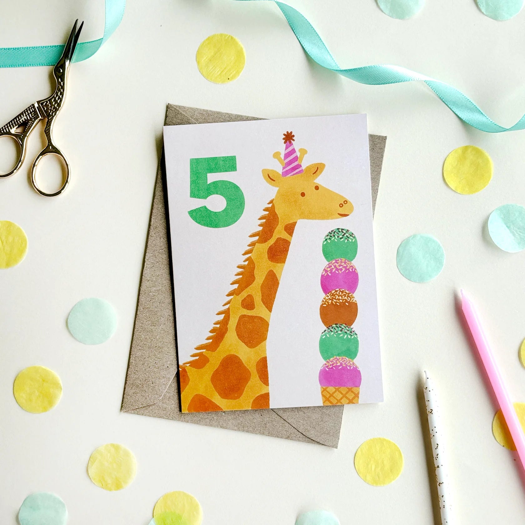 A 5th birthday card with a giraffe on it and an ice cream cone.