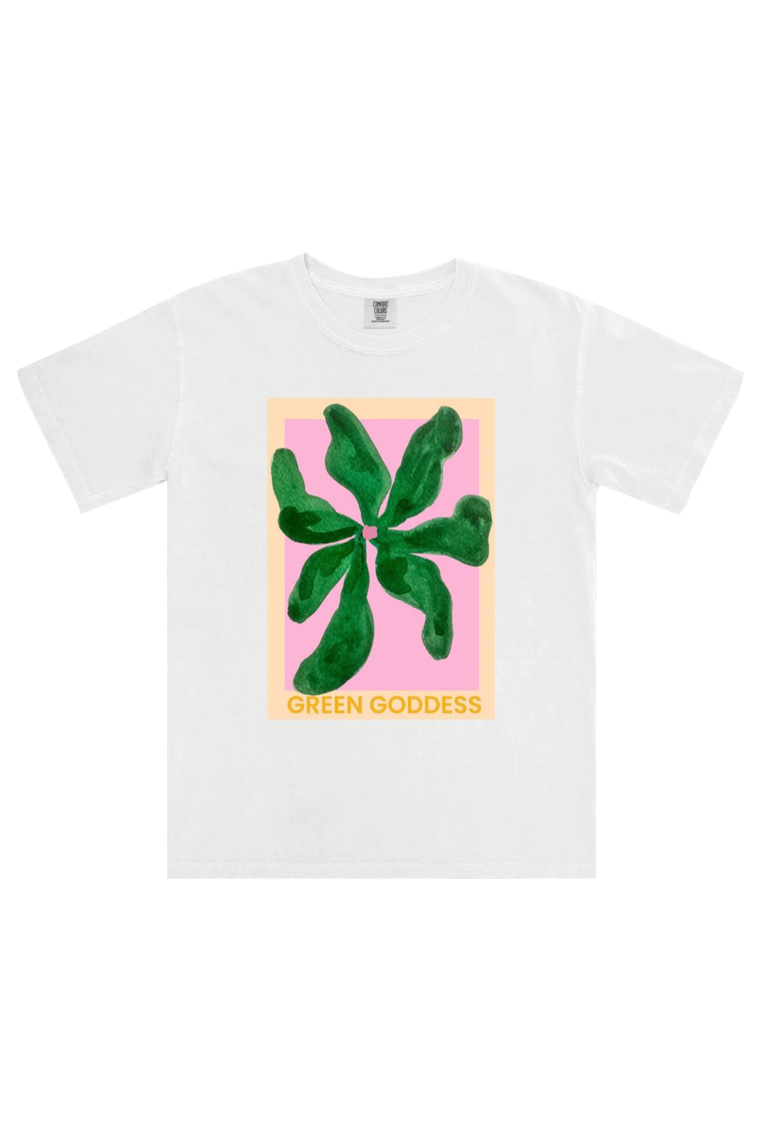 Introducing the Green Goddess T-Shirt by MAKU FENAROLI. This unisex tee, made from 100% cotton, showcases a stylish graphic design featuring green abstract shapes arranged in a circular pattern on a pink background, complete with the text "GREEN GODDESS" underneath. It perfectly blends style and comfort.