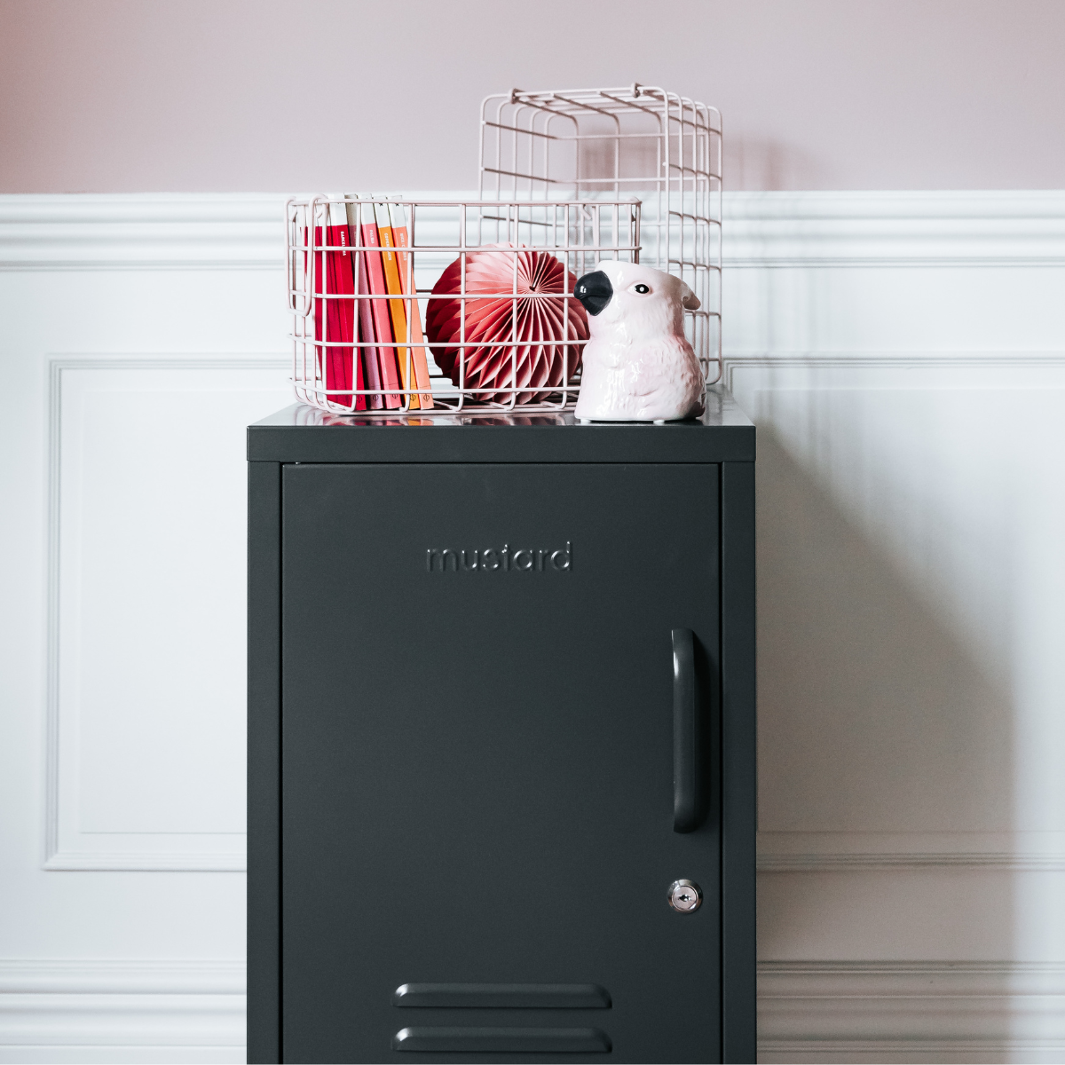 The shorty (to the left) locker in slate with basket on top.