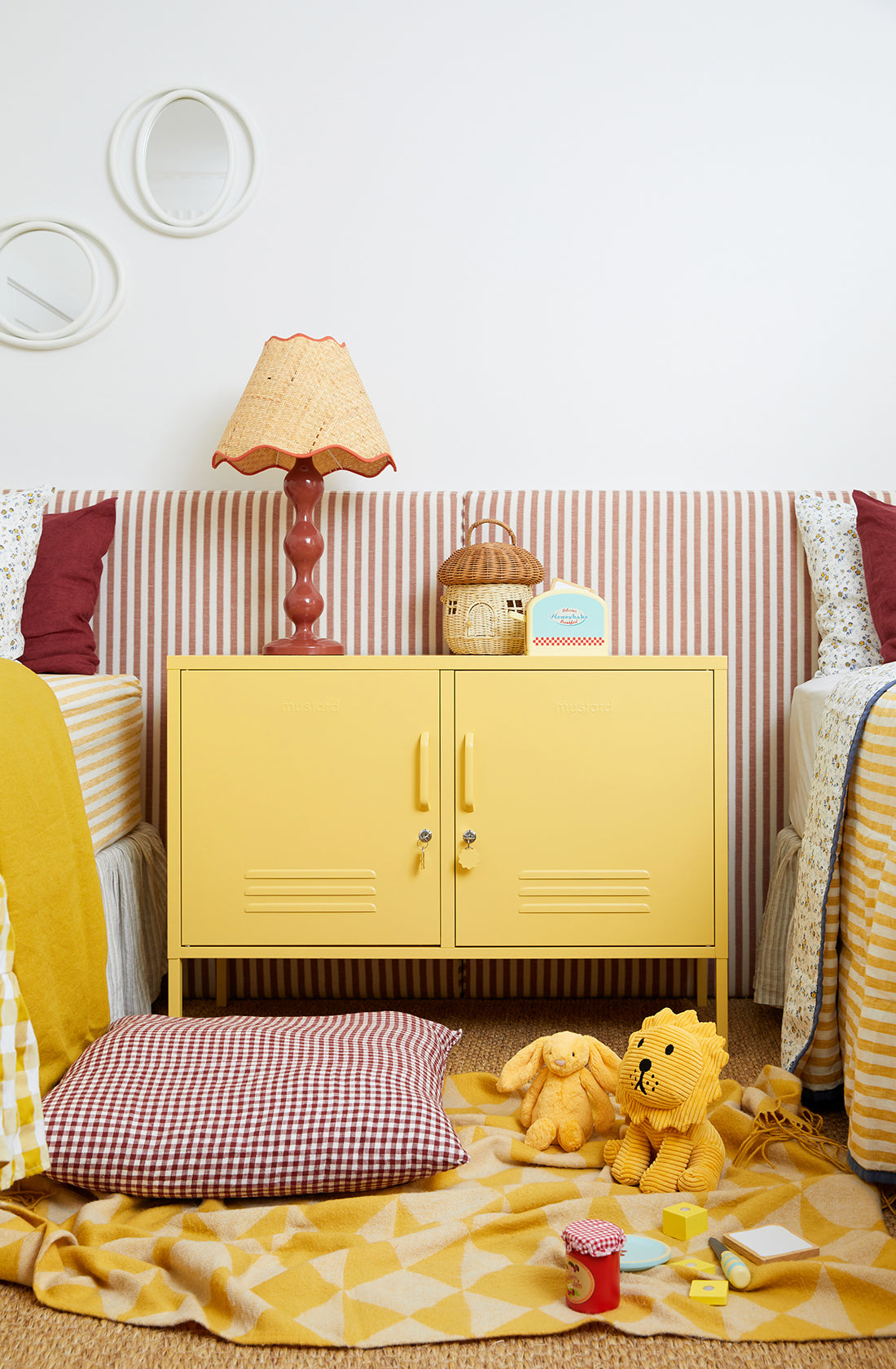 The lowdown locker in butter in kids room in between two beds.